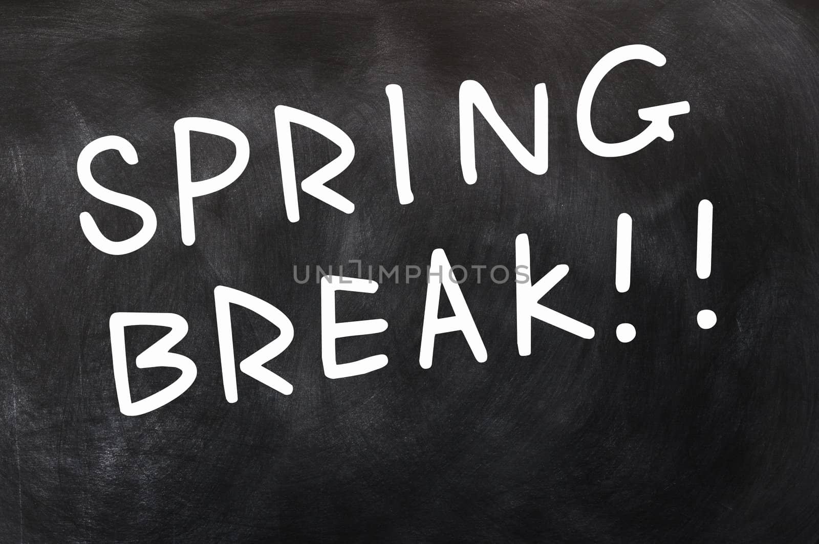 Spring break written on a blackboard
