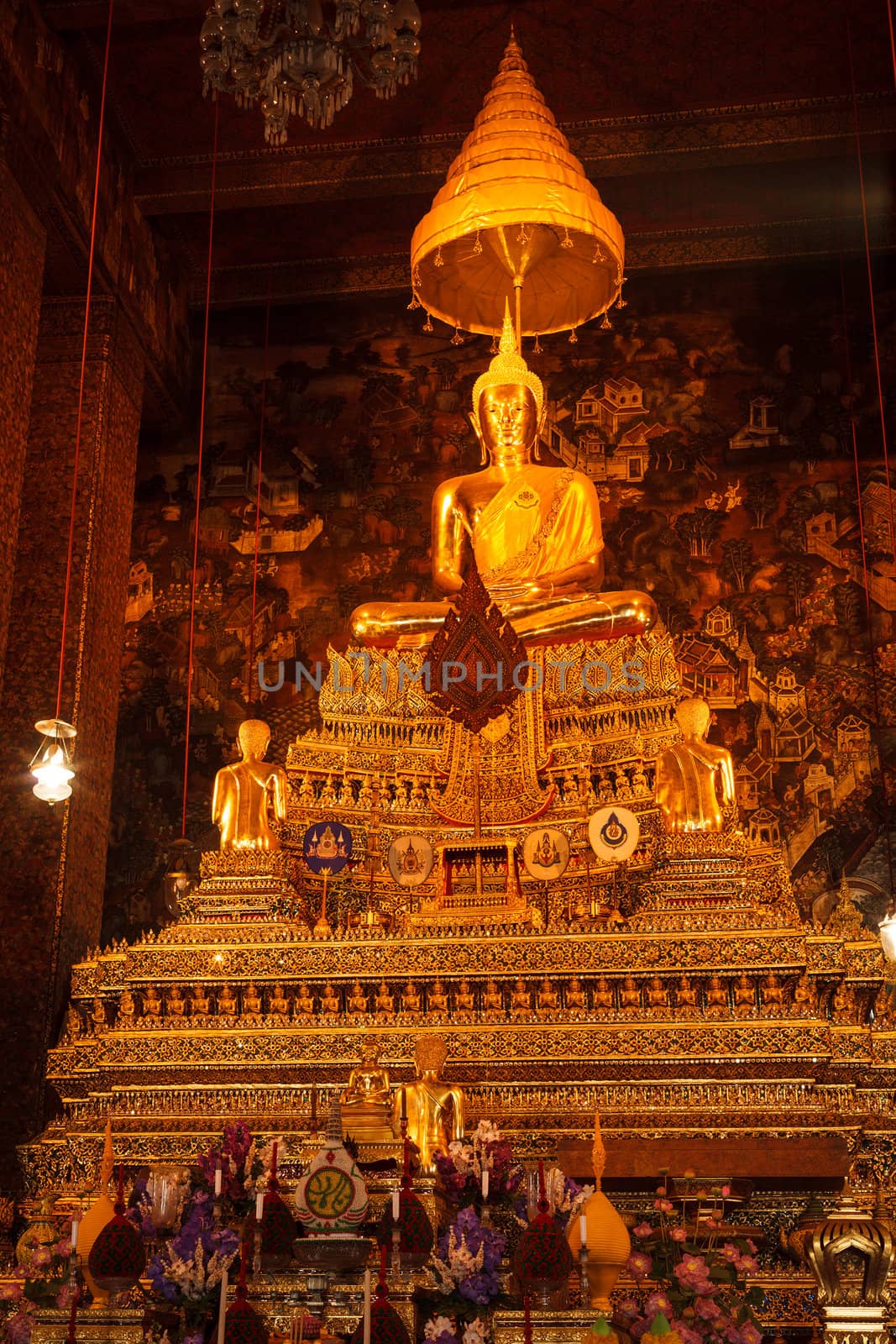 Sitting Buddha Gold Statue in Buddhist Temple. Wat Pho, Bangkok, Thailand