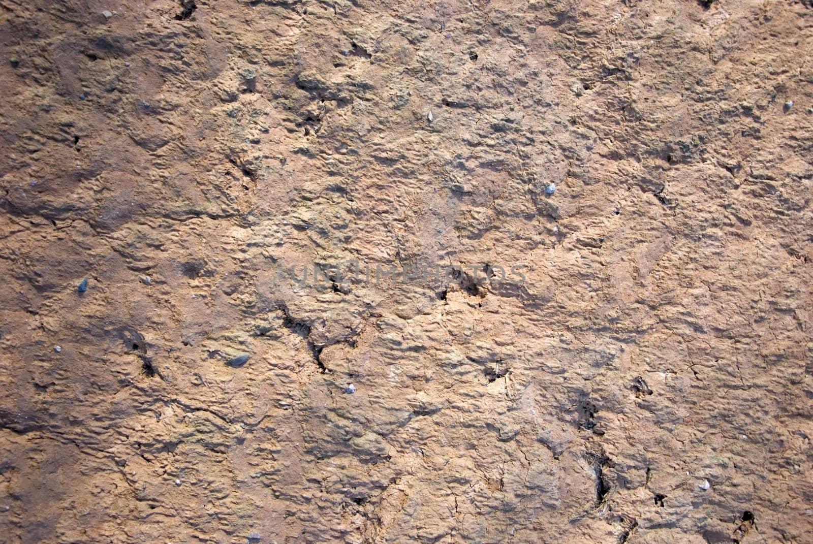 Background - an old building wall made of clay