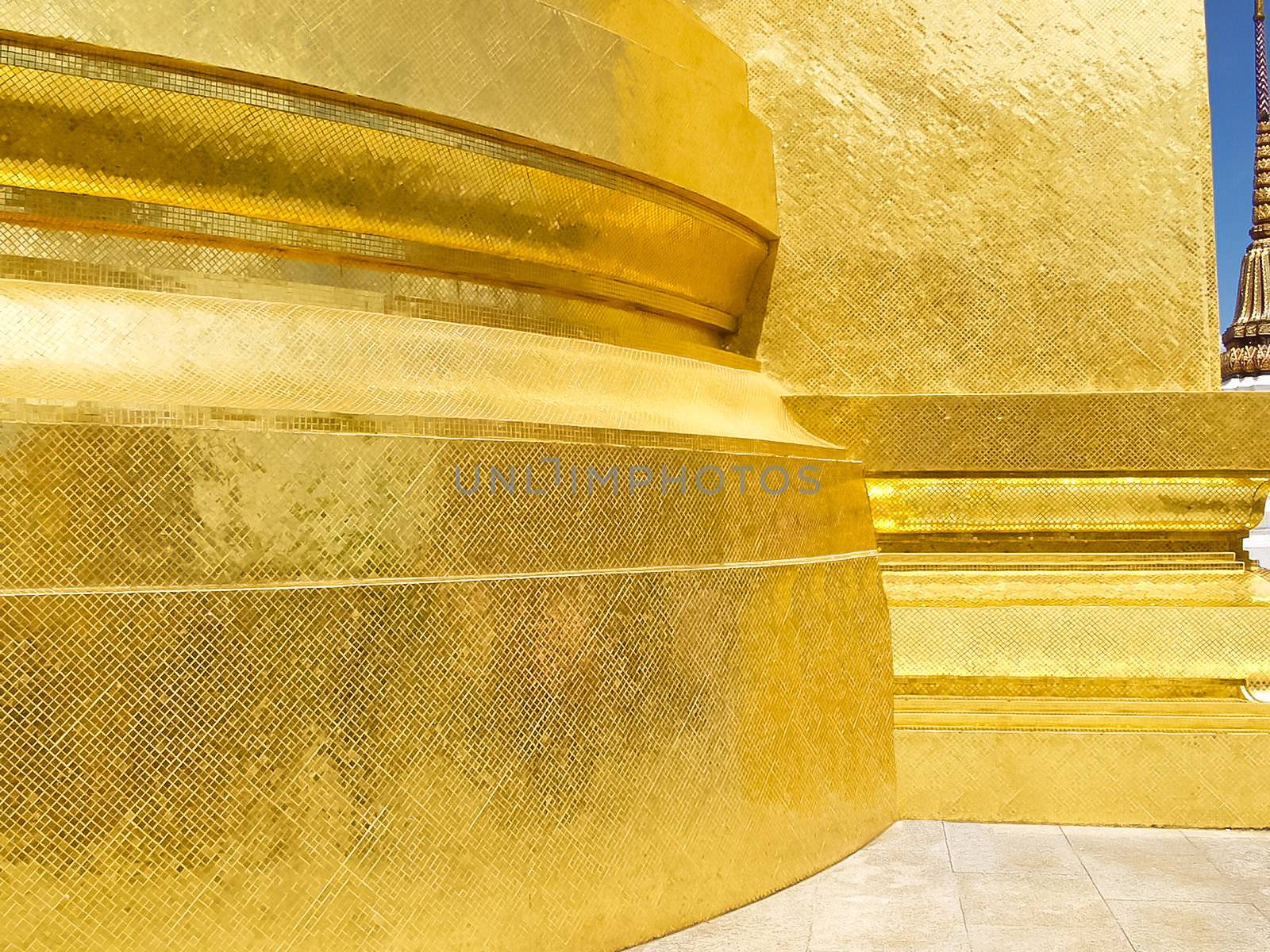 Golden pagoda inside emerald temple, thailand.  by NickNick