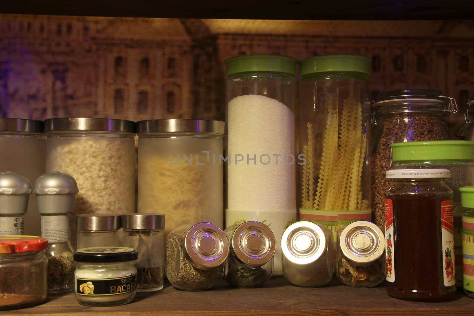 compact storage of cereals and spices in kitchen