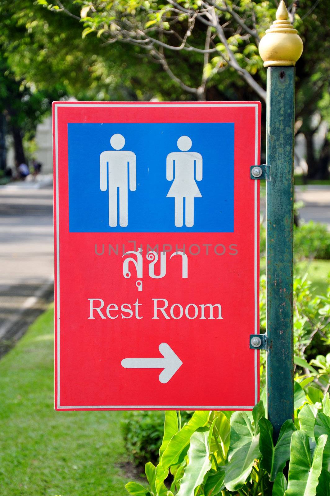 Restroom signs for men and women in Thailand