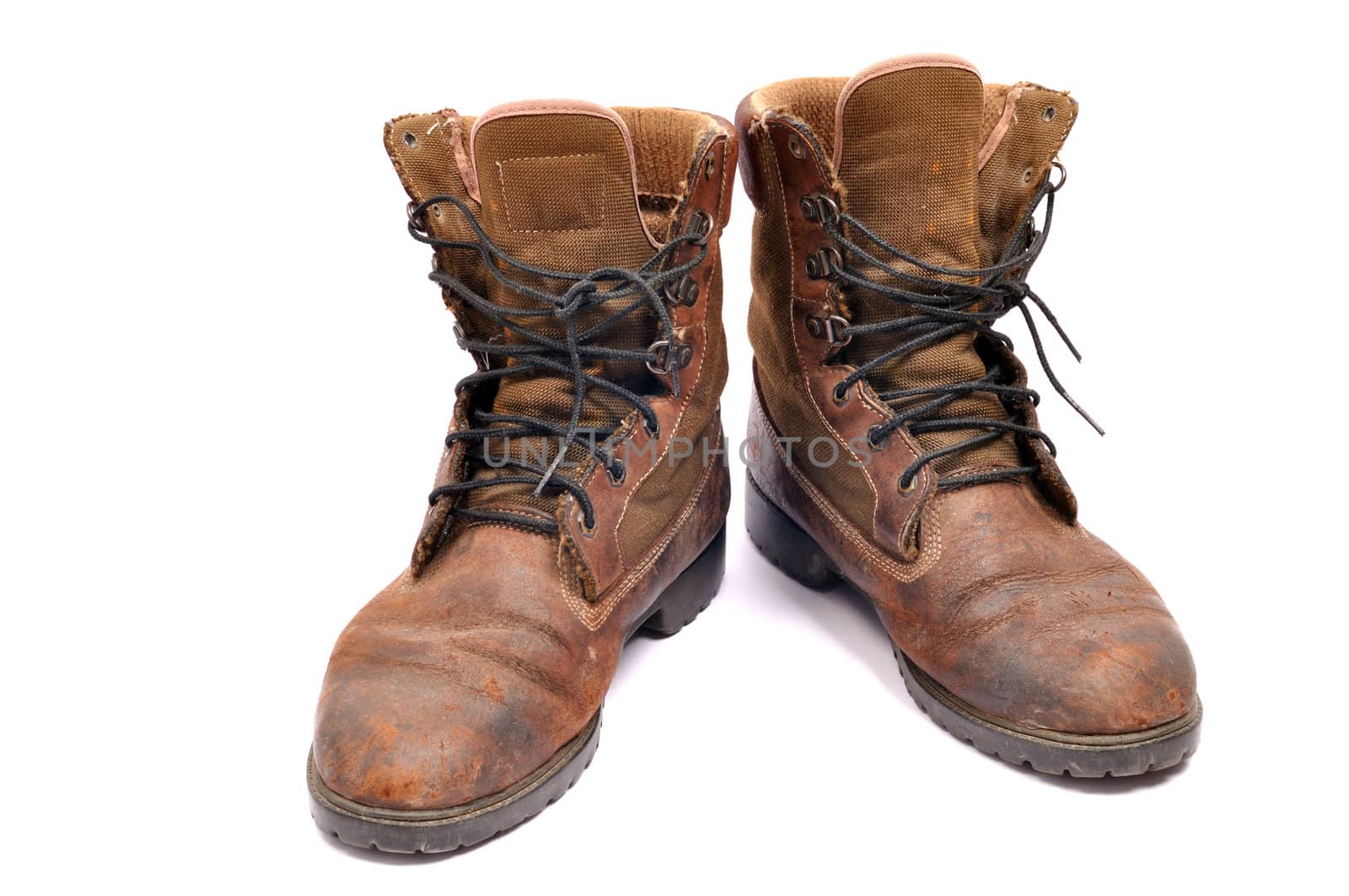 A pair of well worn Work Boots.