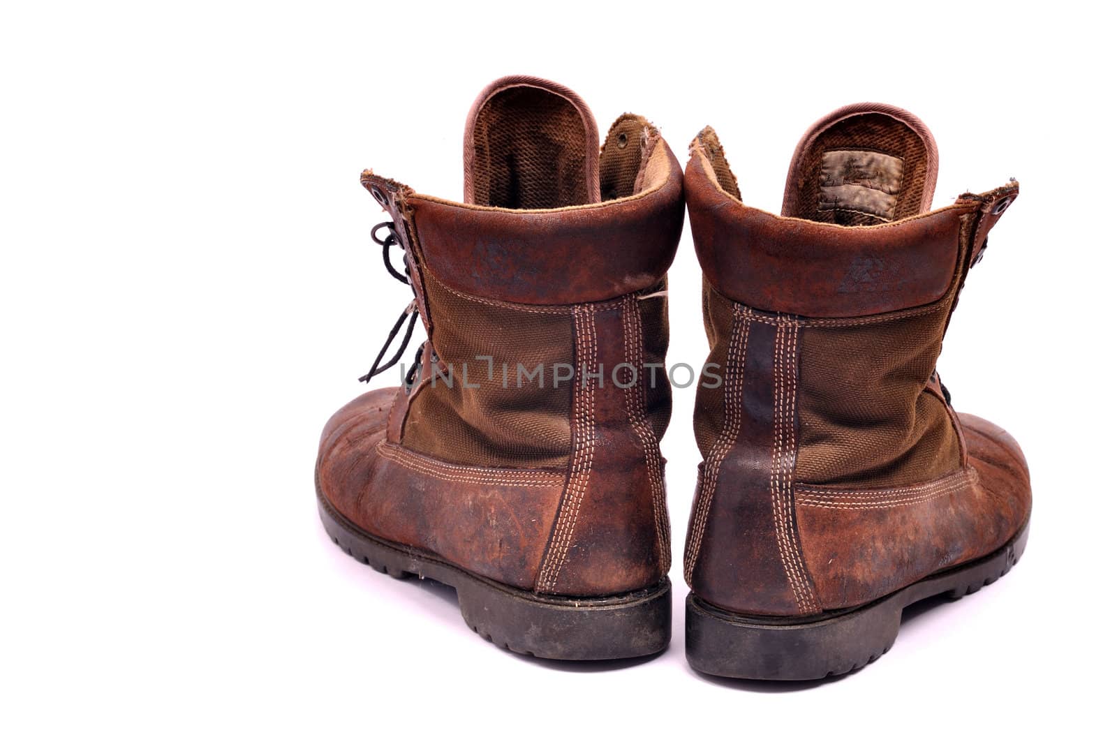 A pair of well worn Work Boots.
