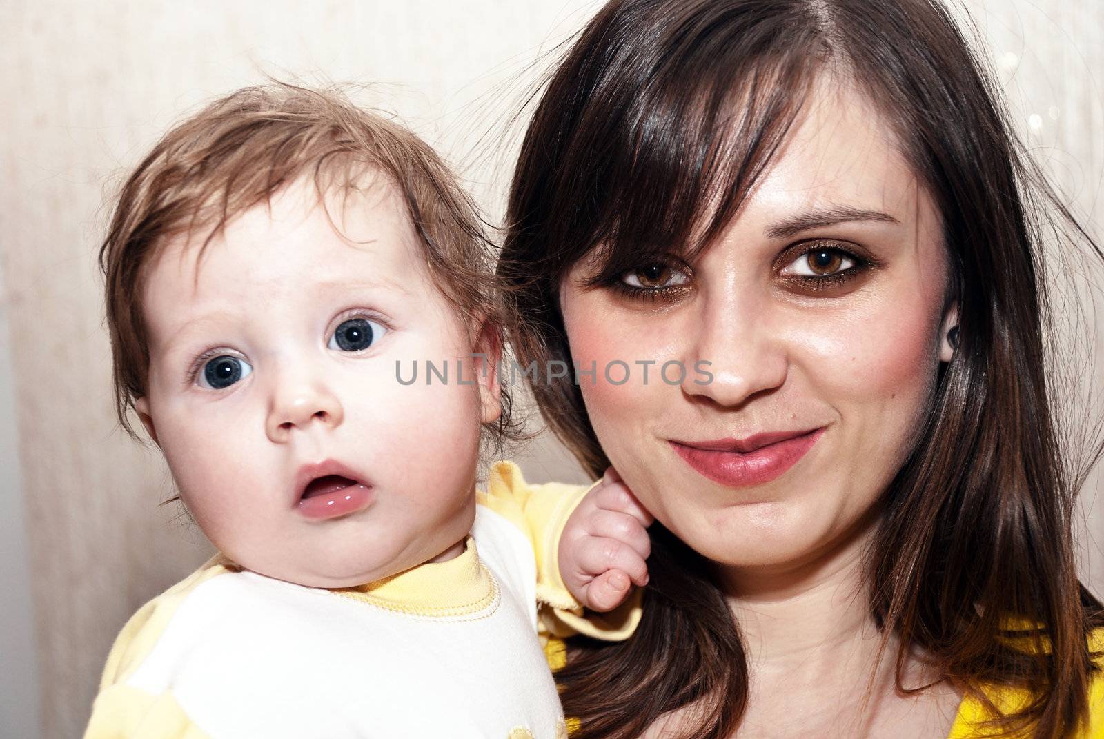 Close-up portrait of happy mother with her son.