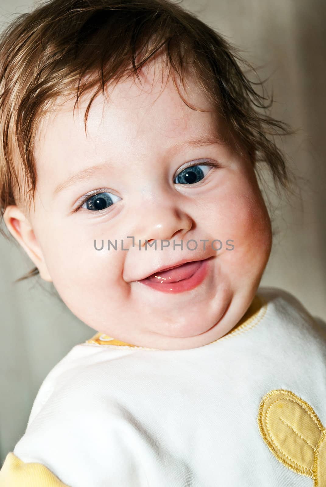 Close-up portrait of a happy little boy.