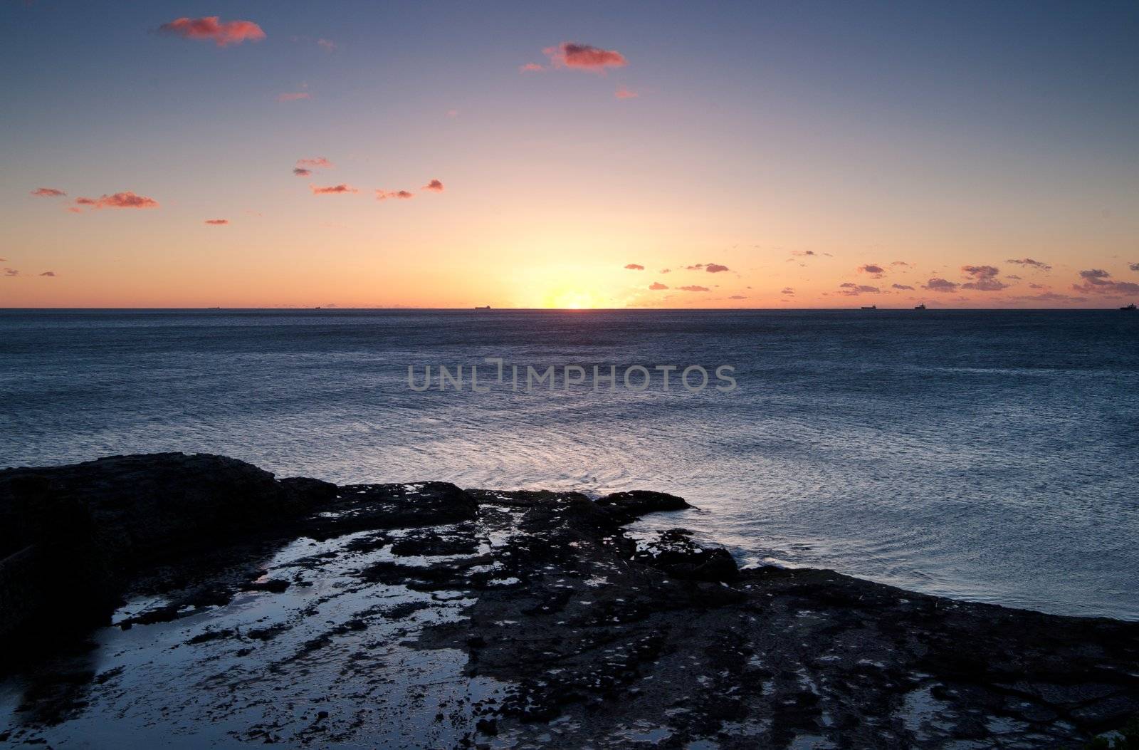 ocean sunrise at wollongong by clearviewstock
