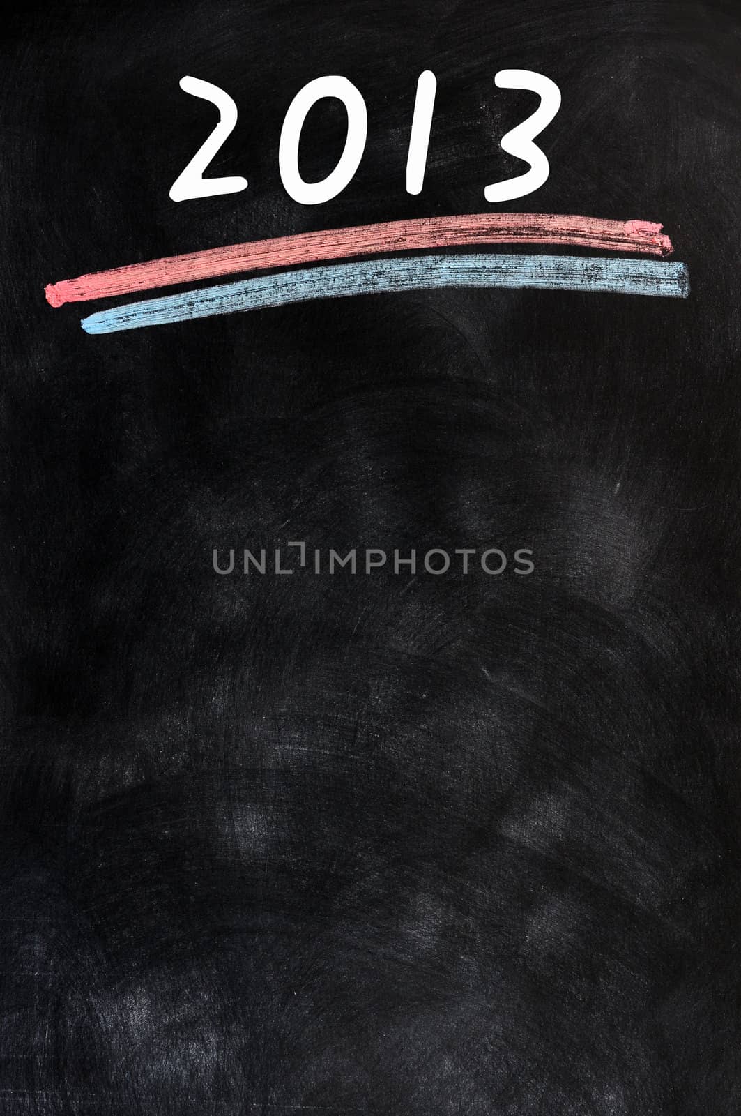 2013 written on a blackboard. Empty blank black chalkboard.
