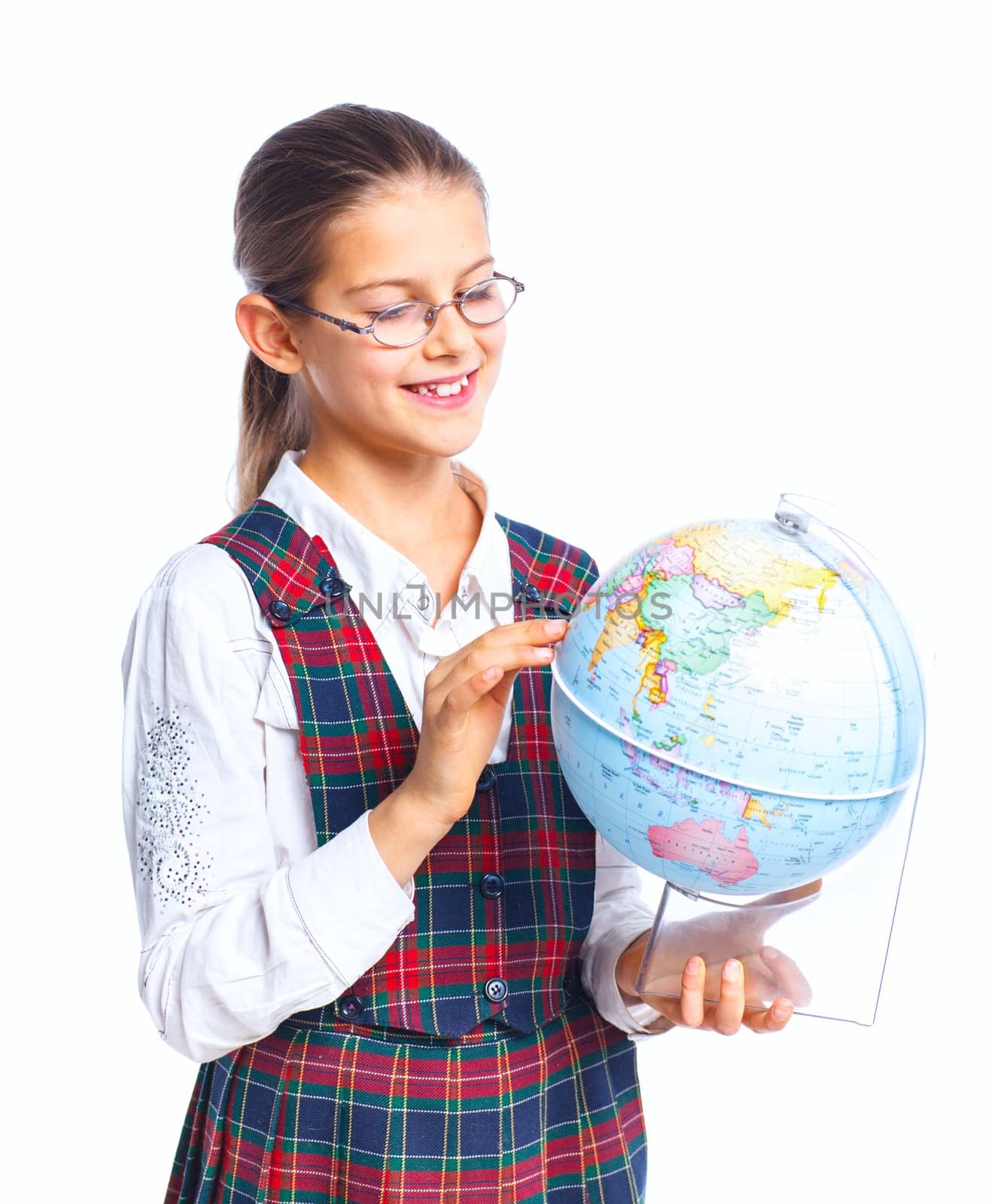 Schoolgirl holding a globe. Isolated. Vertical view