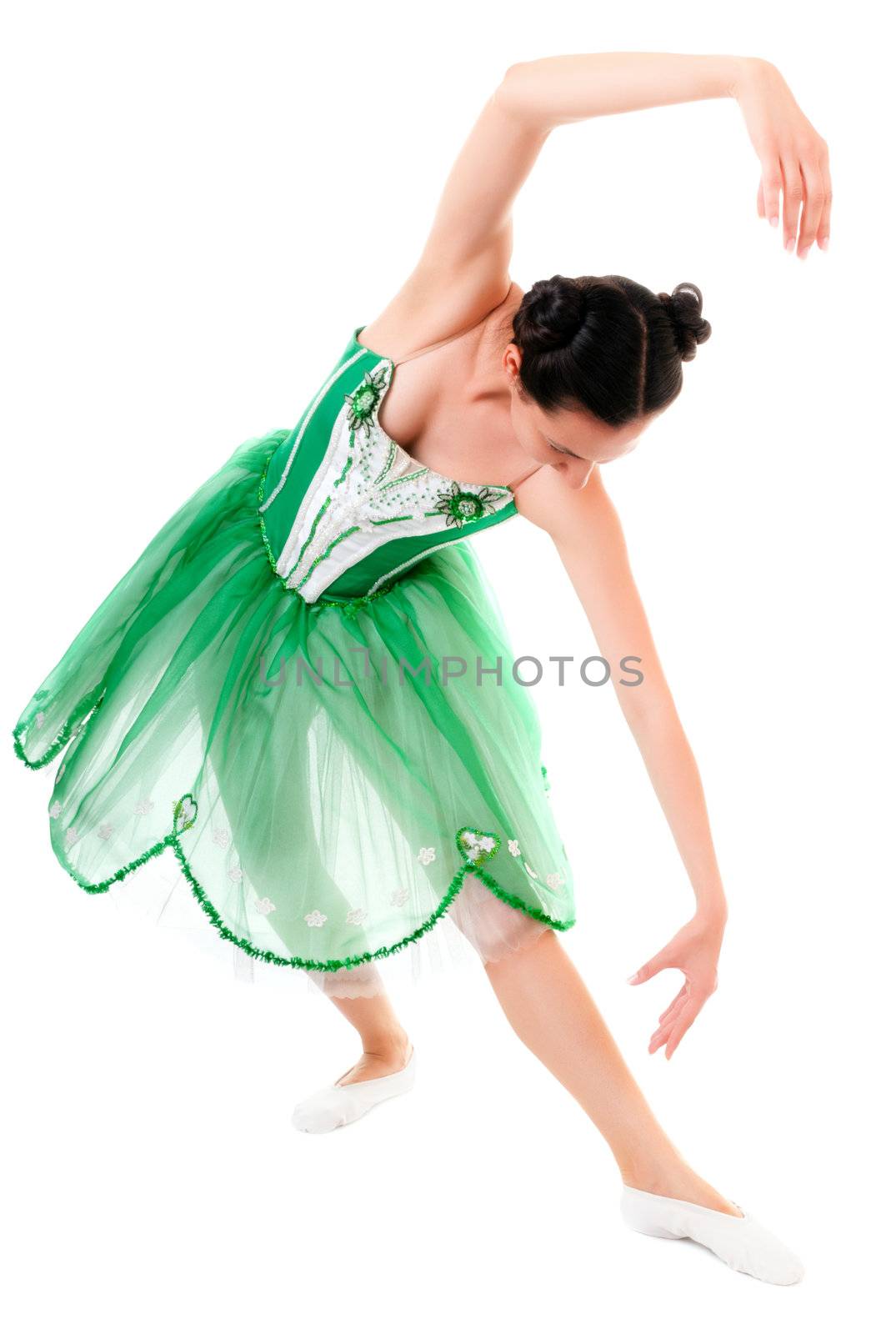 Exercising ballerina in green dress isolated on white background
