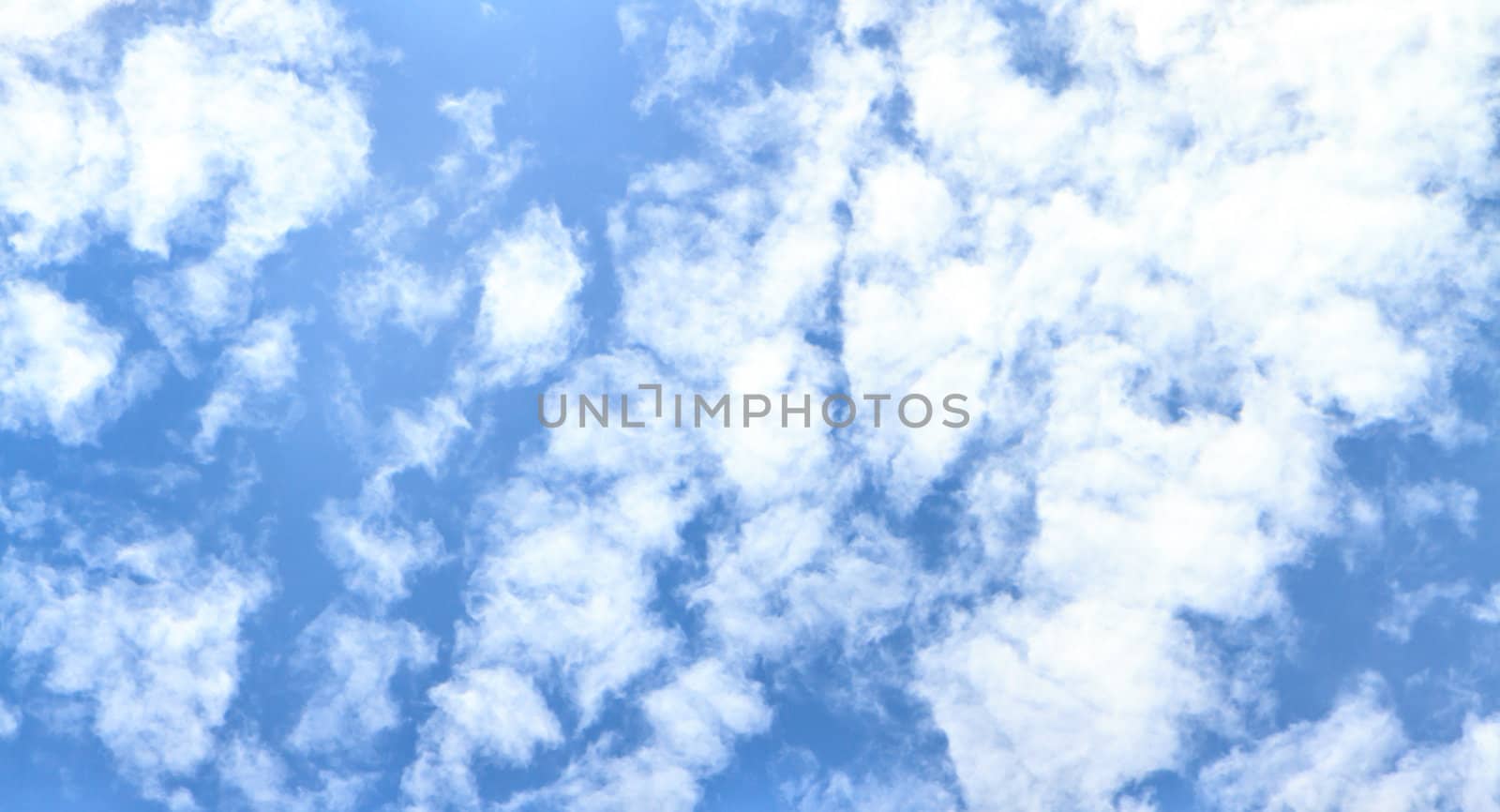 Blue sky with clouds by bunwit