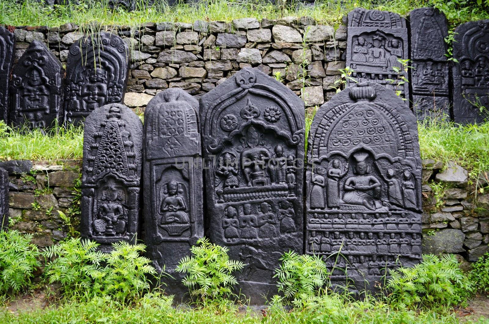 Ancient indian god of art represented in black stone