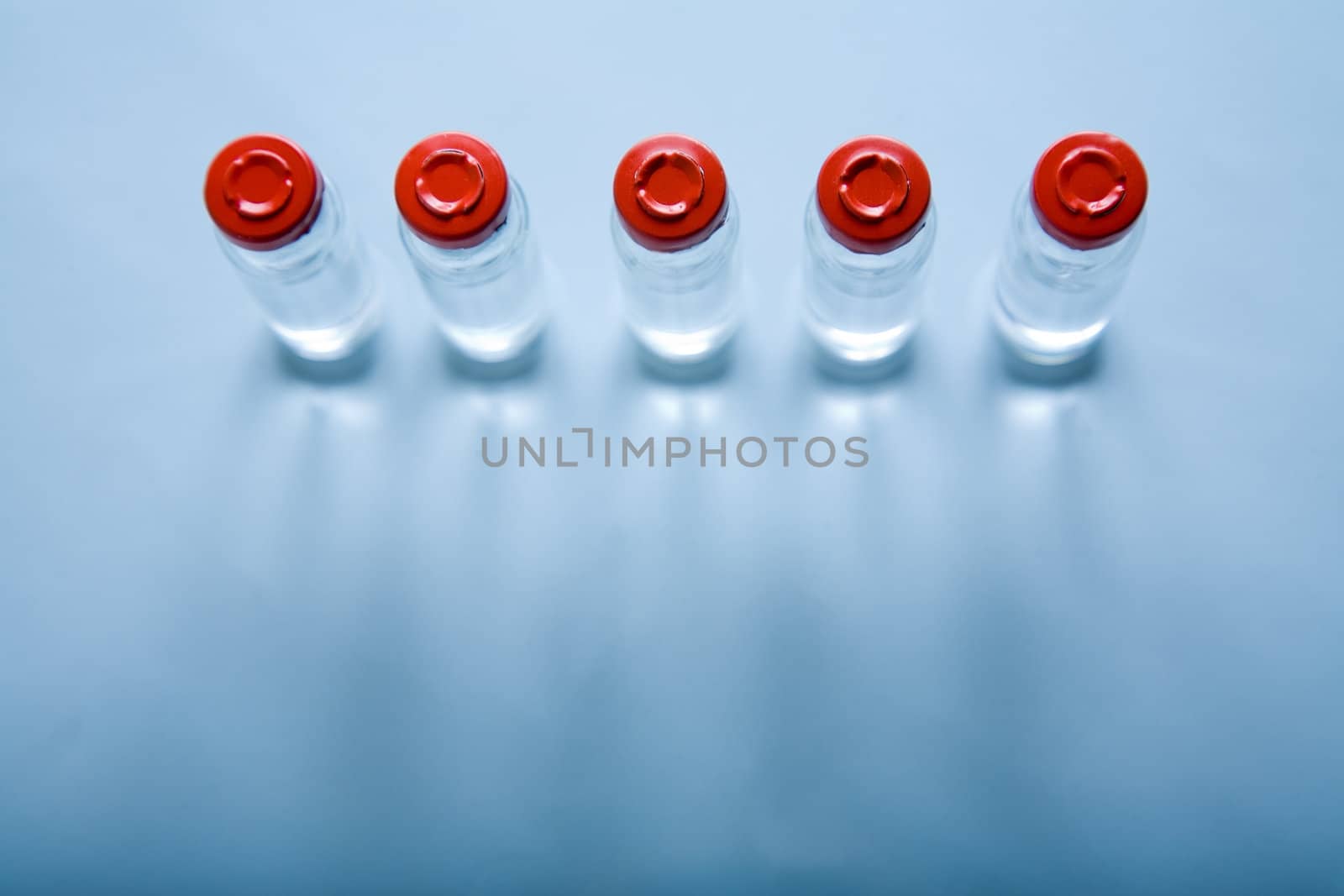 Vials with liquid for medicine or science  by Elisanth