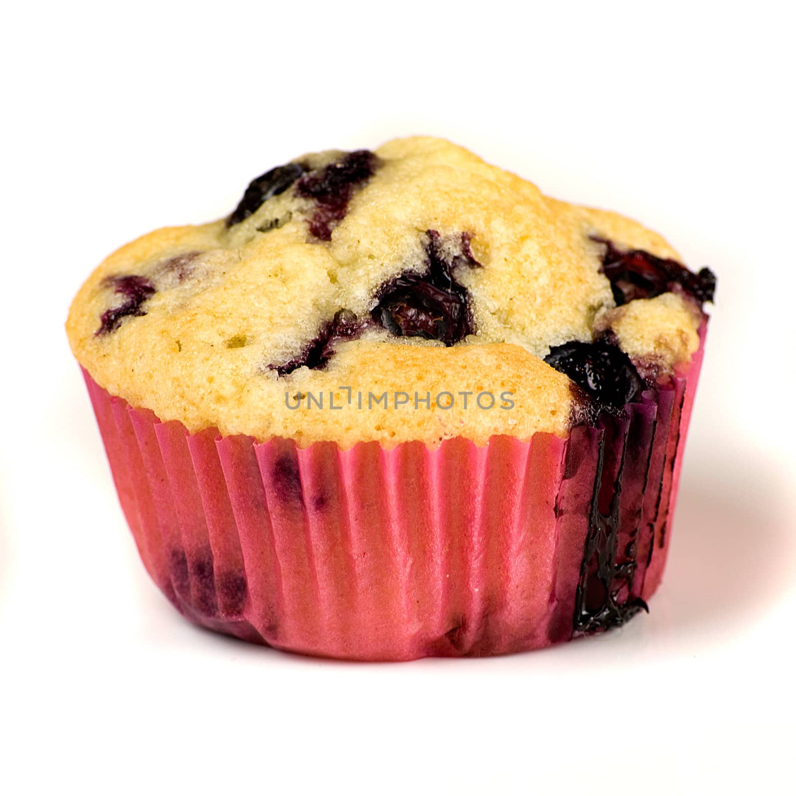 homemade blueberries muffins isolated on white background
