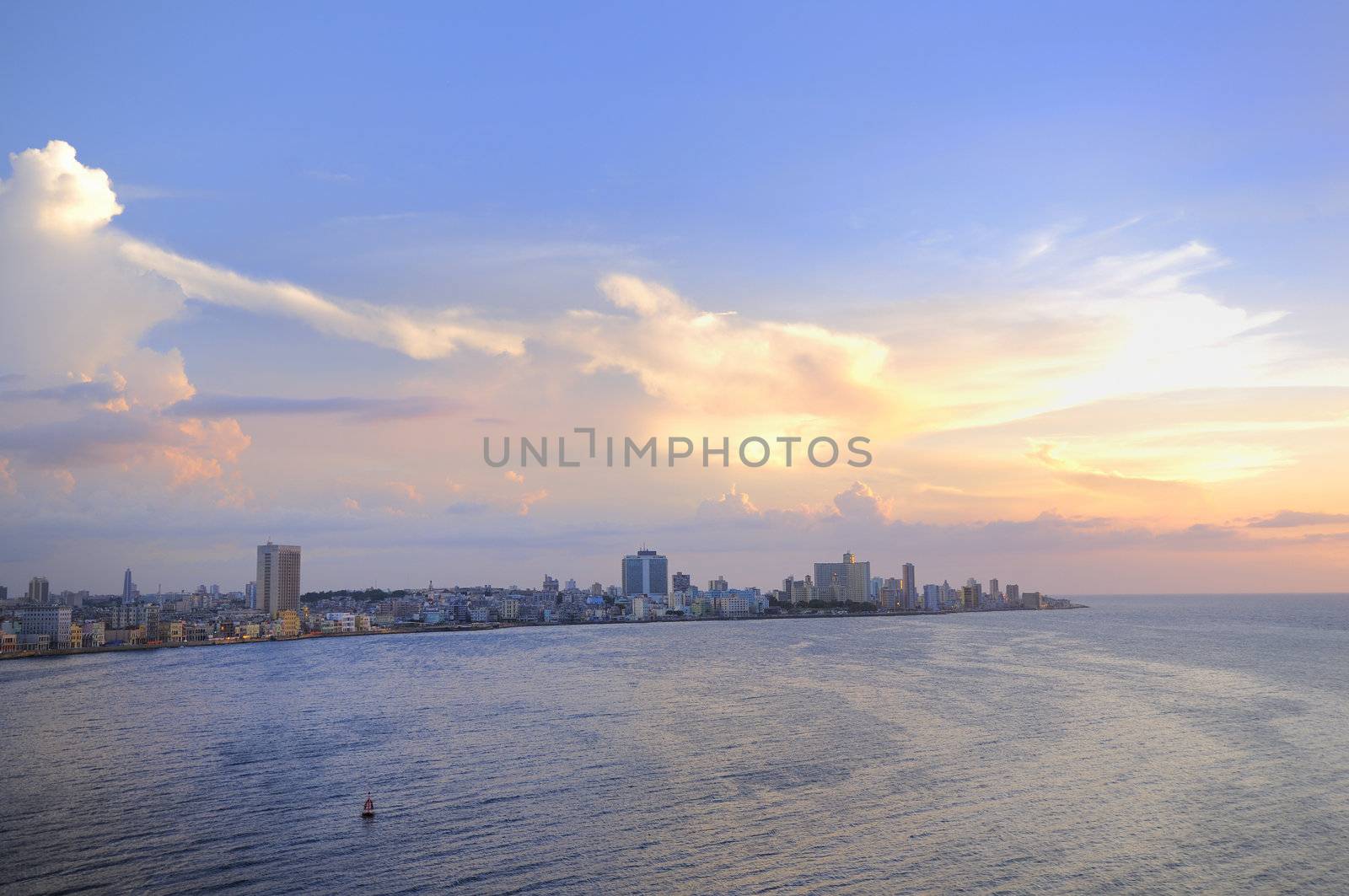 Havana bay entrance and city skyline at sunset time