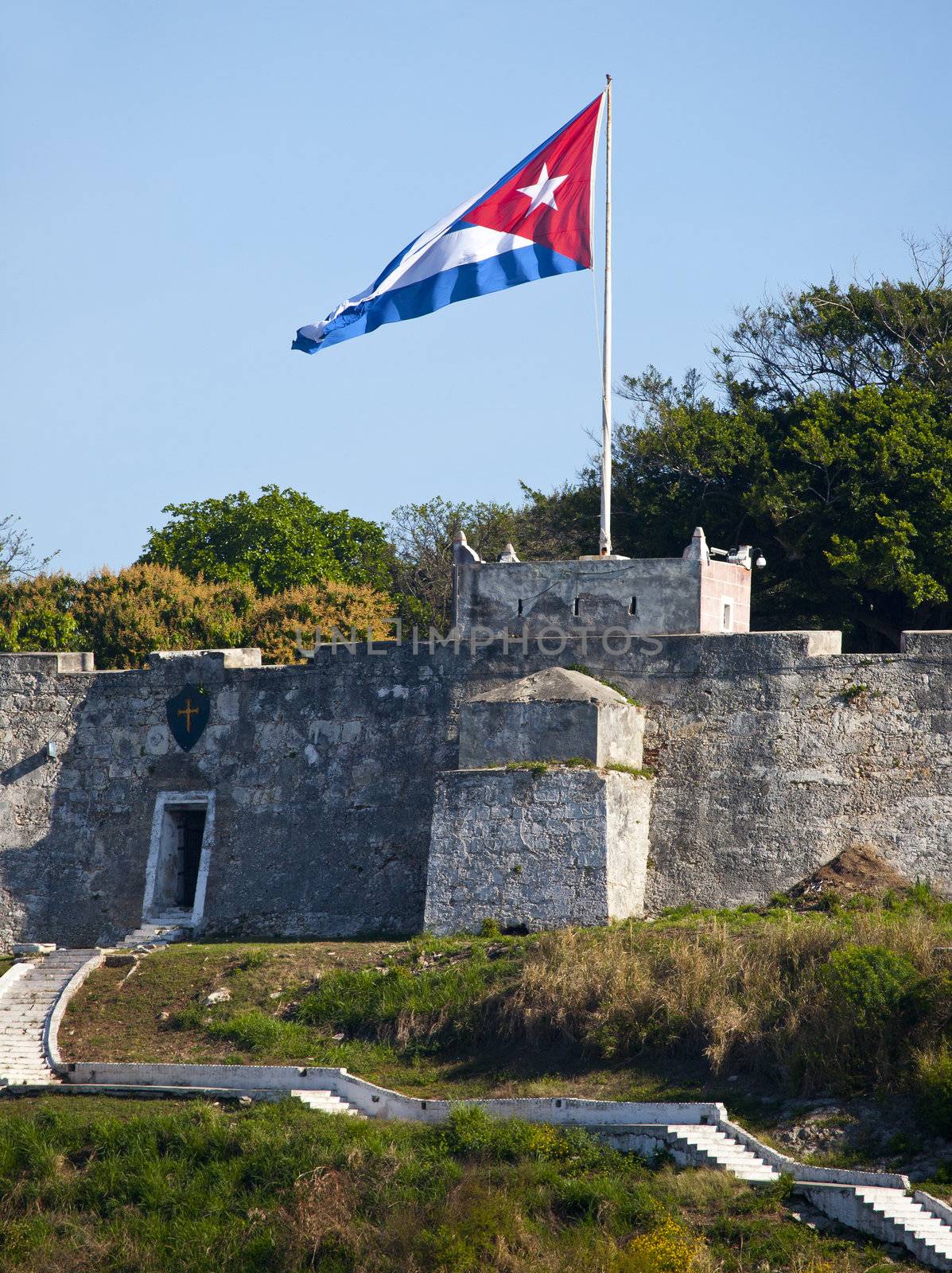 Cuban flag waving on spanish fortress "La Caba�