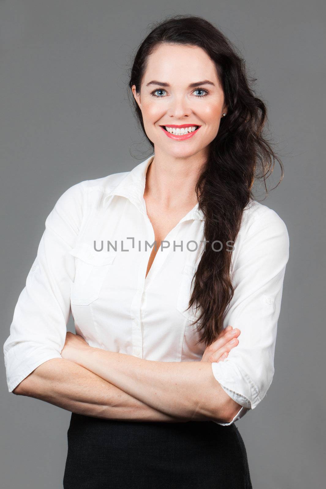 Portrait of happy business woman by Jaykayl