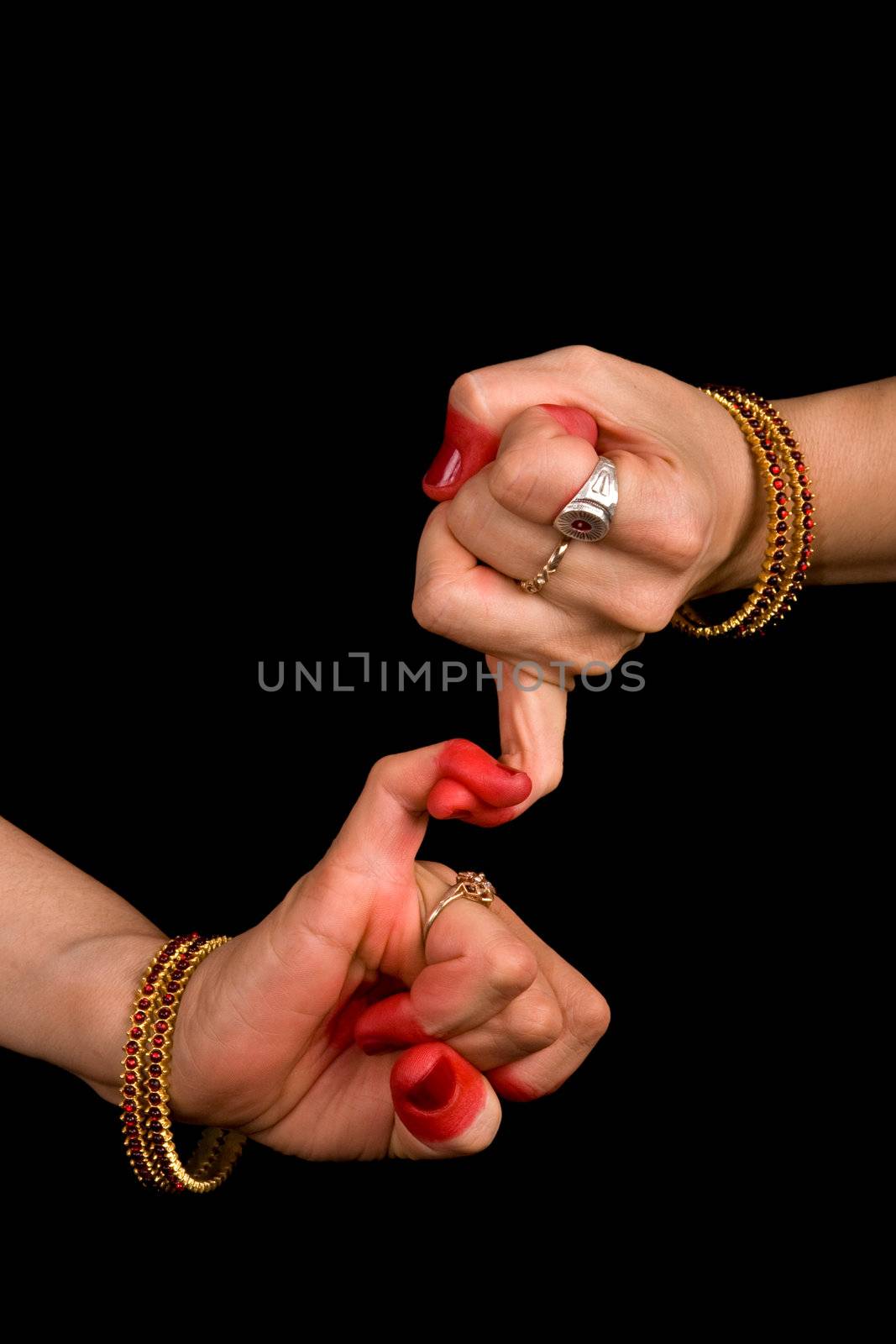 Woman hand showing Kilaka hasta of indian classic dance Bharata Natyam