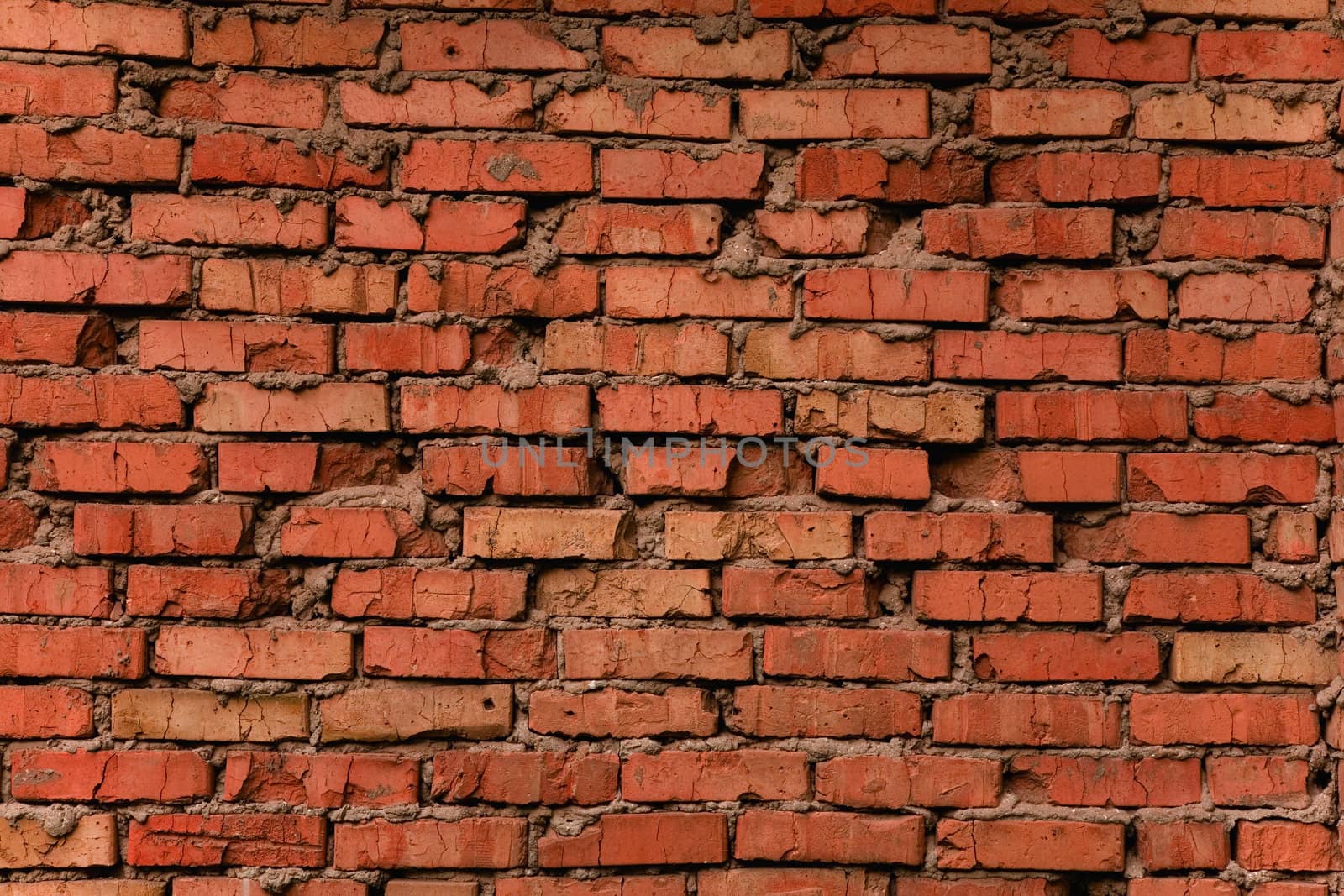 Grungy cracked brick texture, natural light  