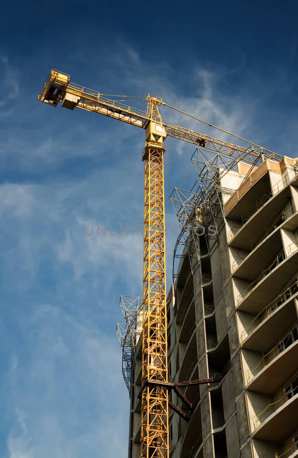 Construction work site over blue sky background 