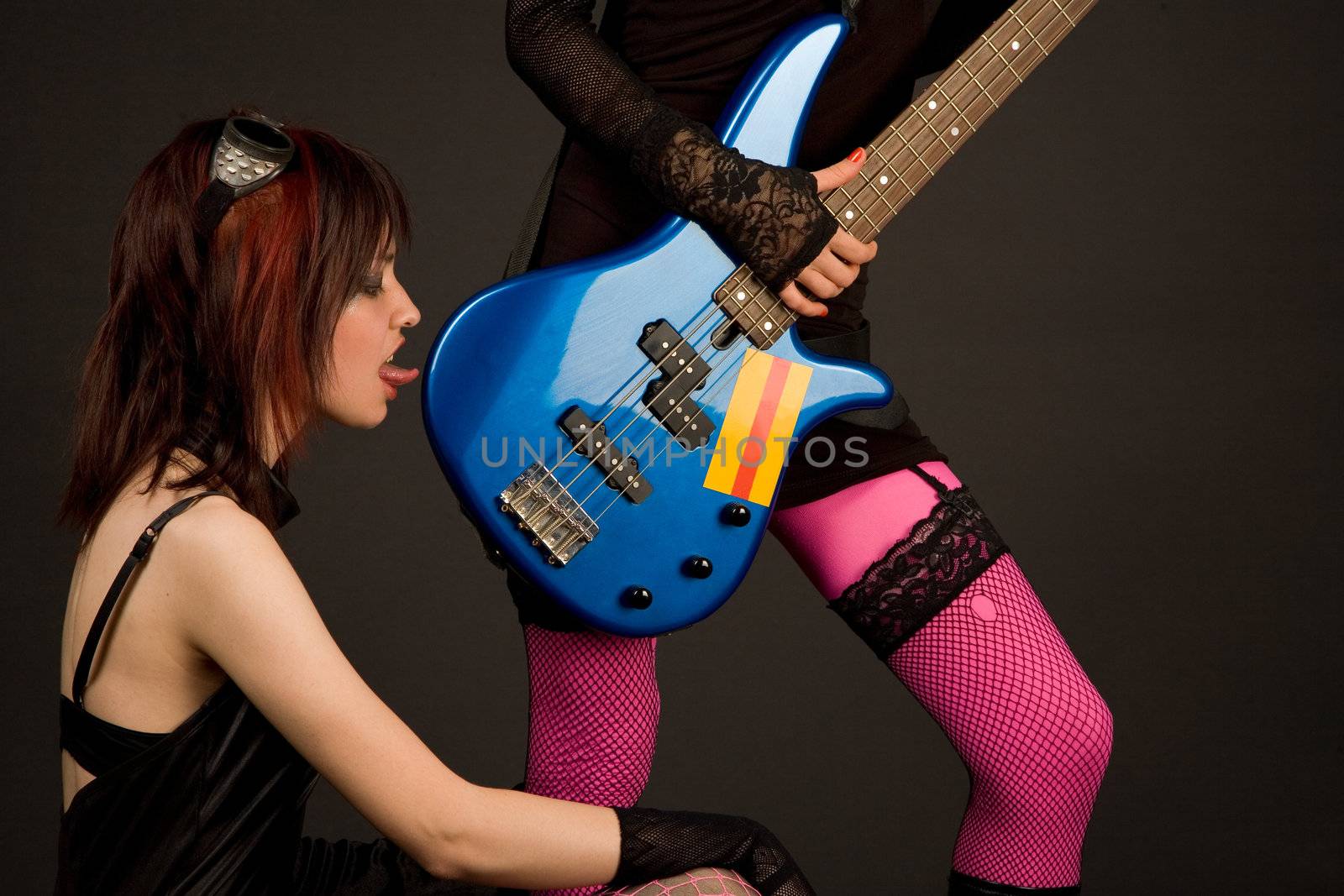 Rock girl licking bass guitar by Elisanth