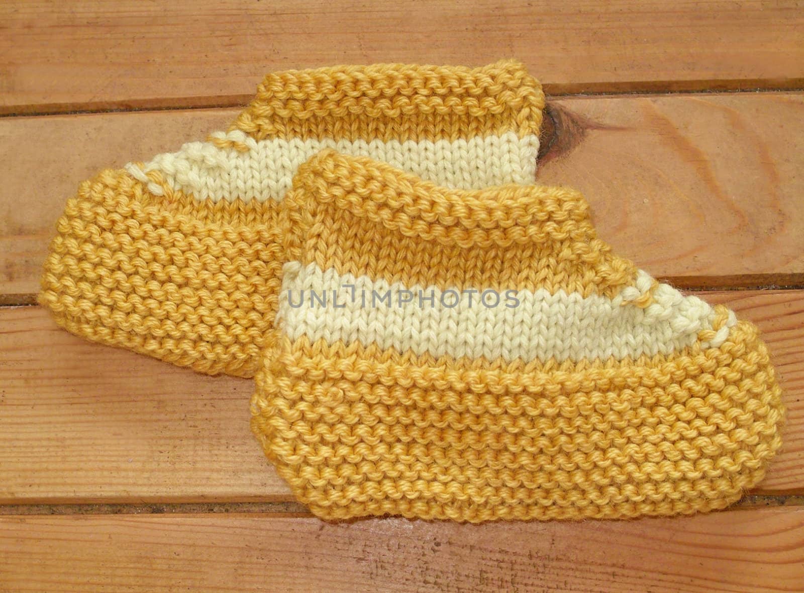 Hand knitted baby booties by sattva