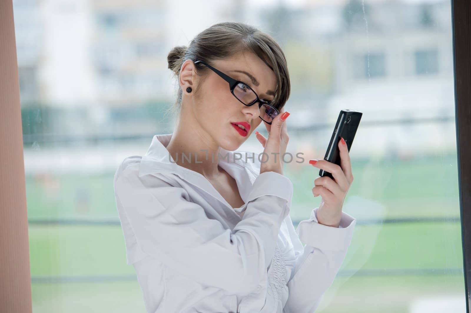 beautiful bussines woman with laptop and phone