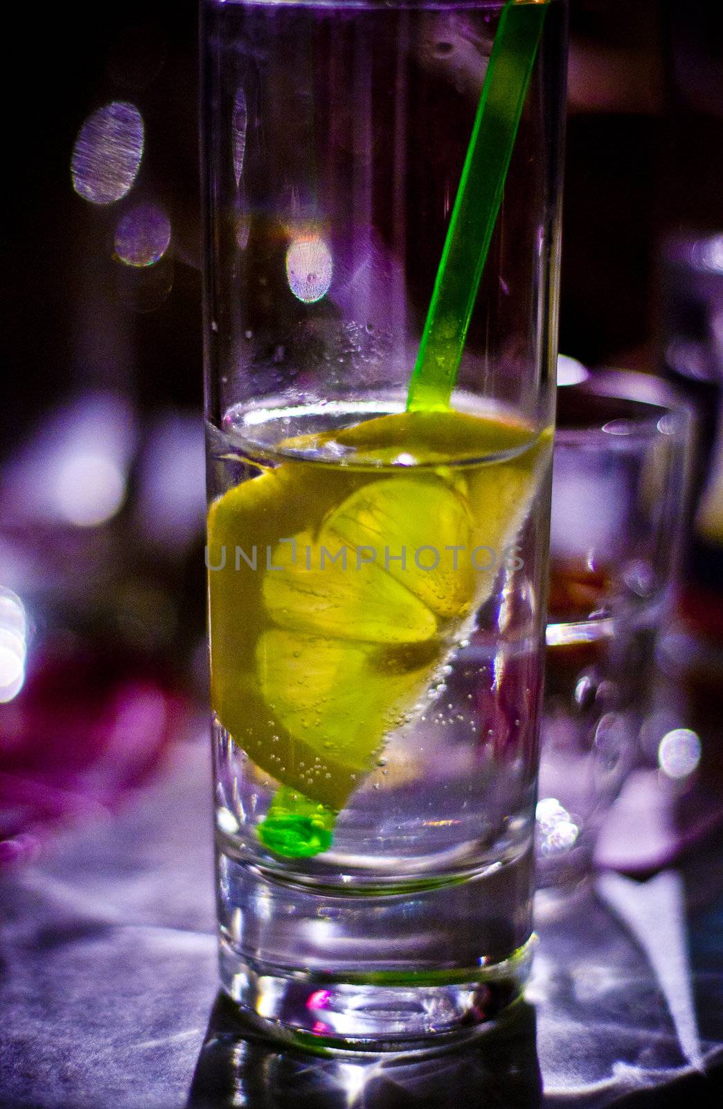 A vodka soda long drink on a table.