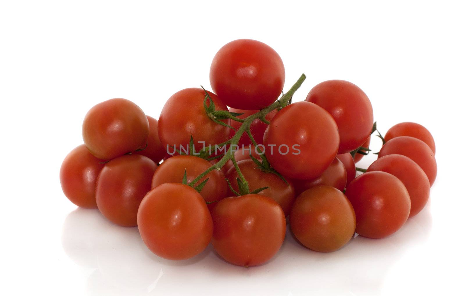 isolated fesh red cherry tomatoes 
