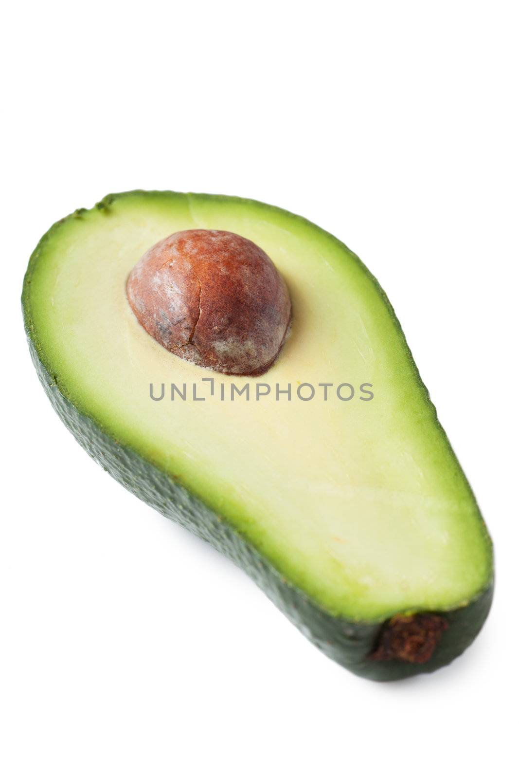 Fresh avocado fruit isolated over white background