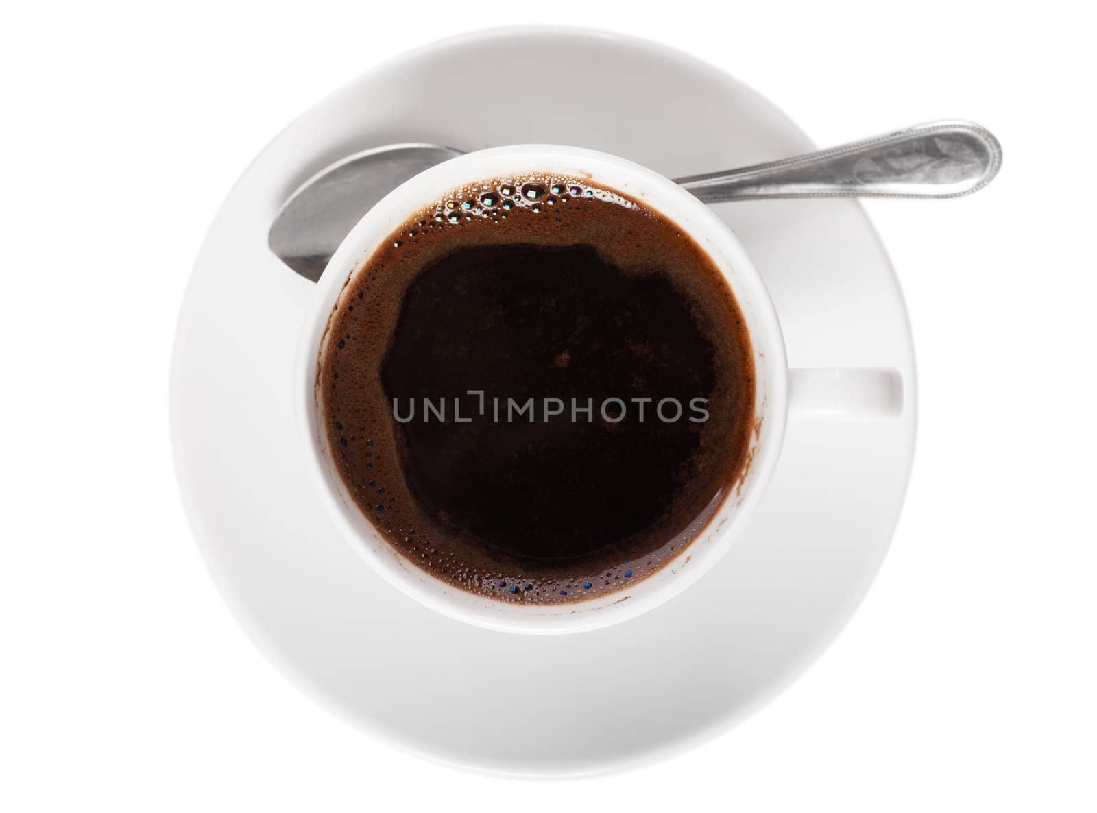 White cup of coffee and spoon isolated over white background