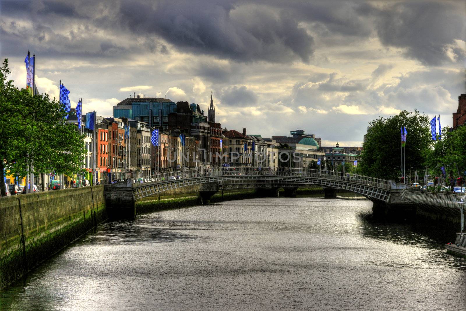 Ha'penny bridge on River Liffey in Dublin city, Ireland, HDR image