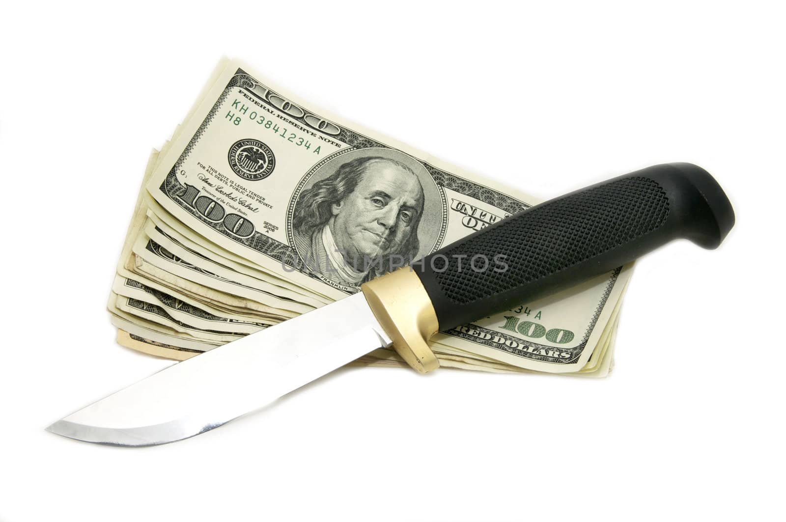 dollars and a knife on a white background