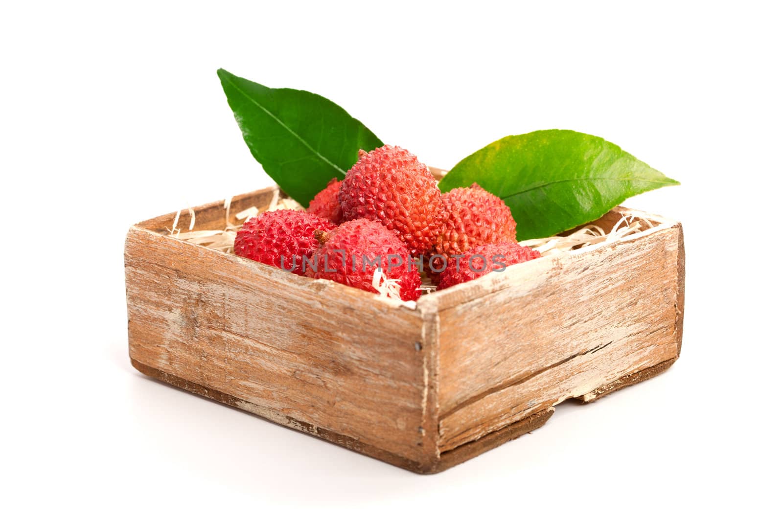 fresh lychees on white background