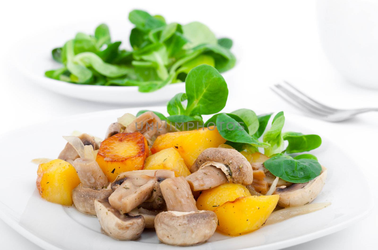 Champignon mushrooms served with baked potato and salad by motorolka