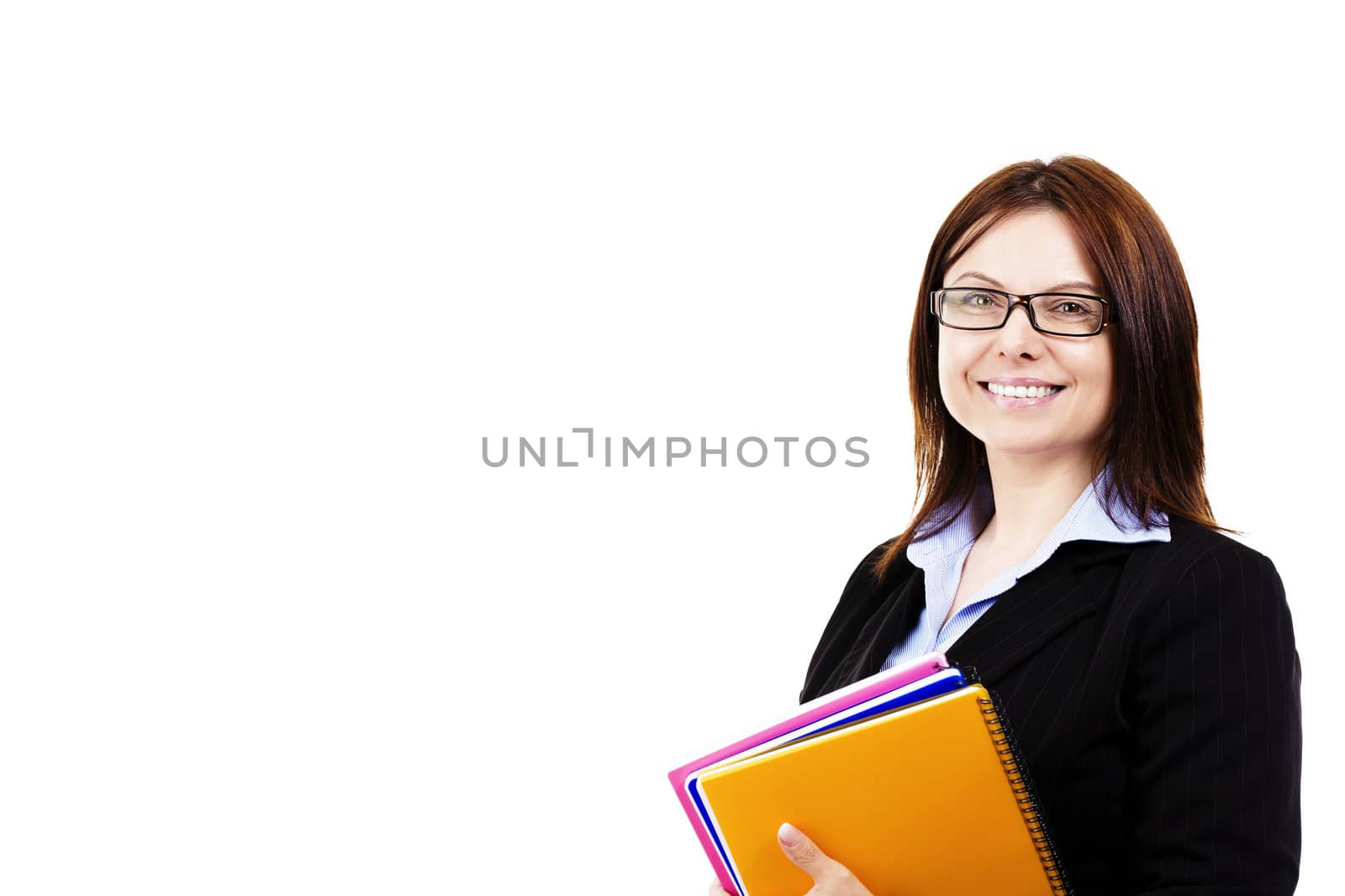 smiling business woman holding pads of notepaper on white background