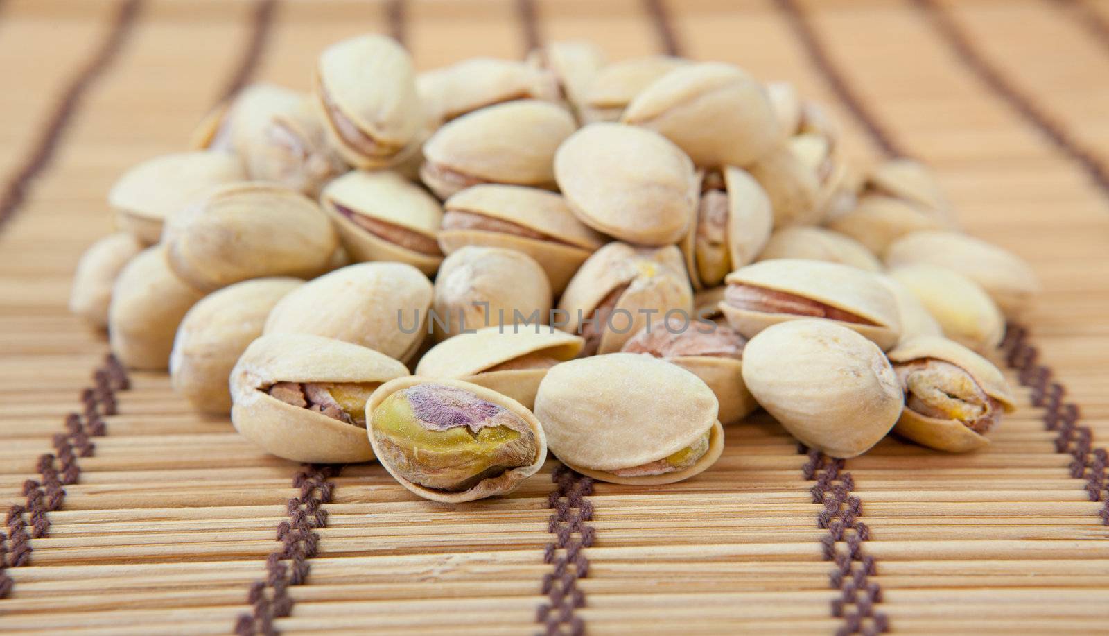 Dried pistachios by witthaya