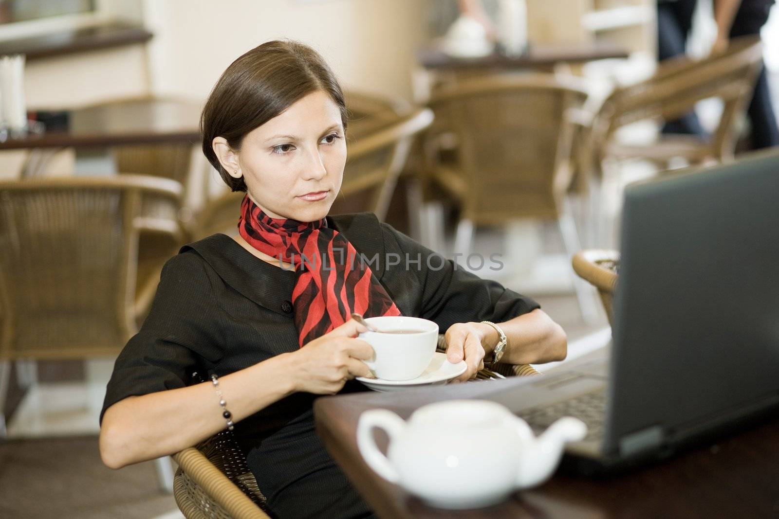 An image of a nice woman in a cafe