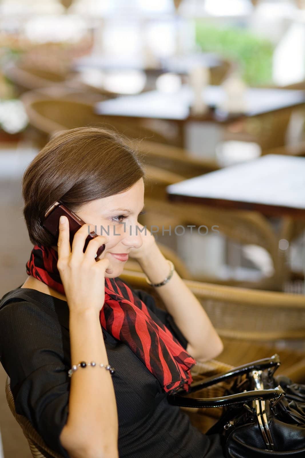 An image of a nice woman with a mobile phone