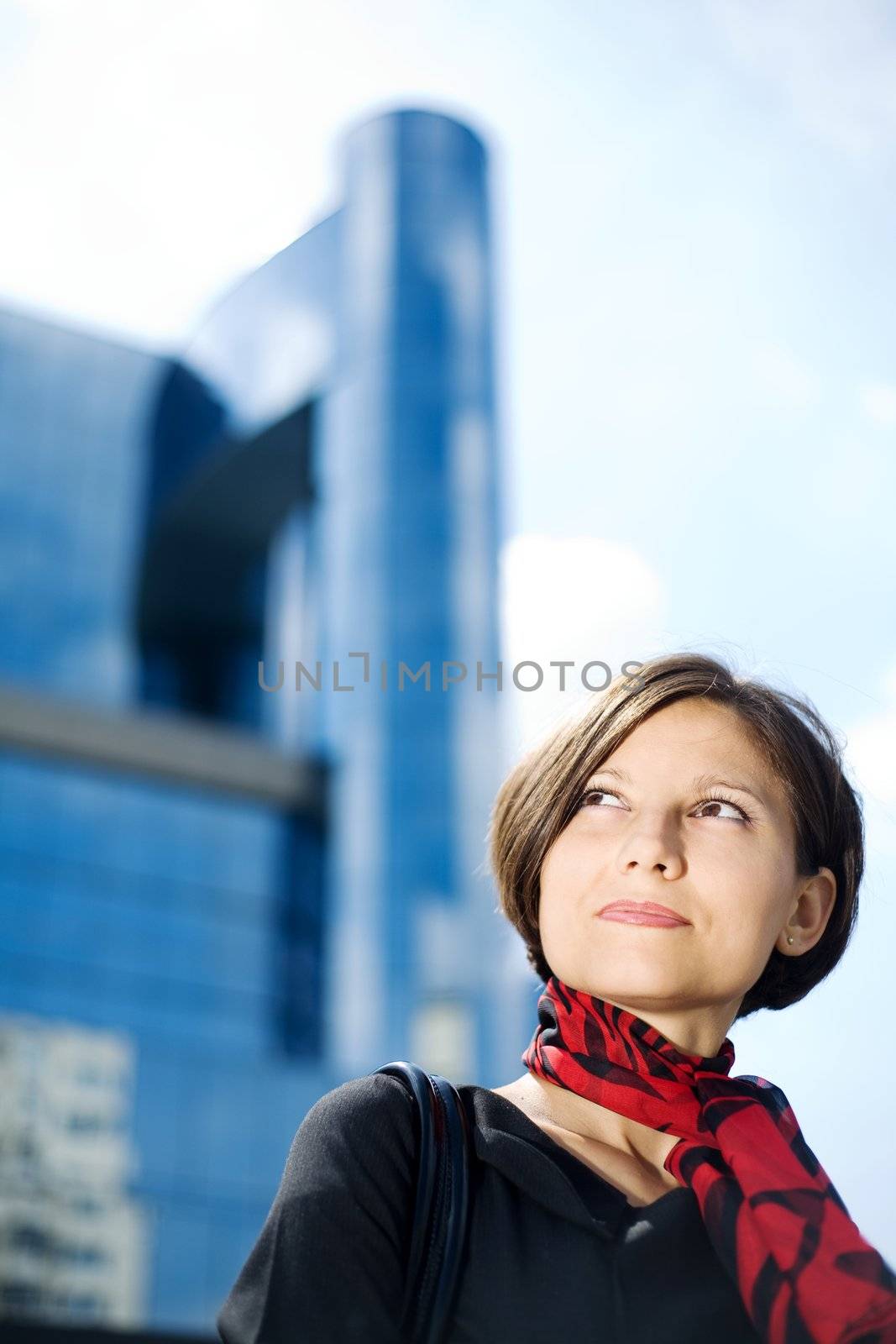An image of a young woman in the city