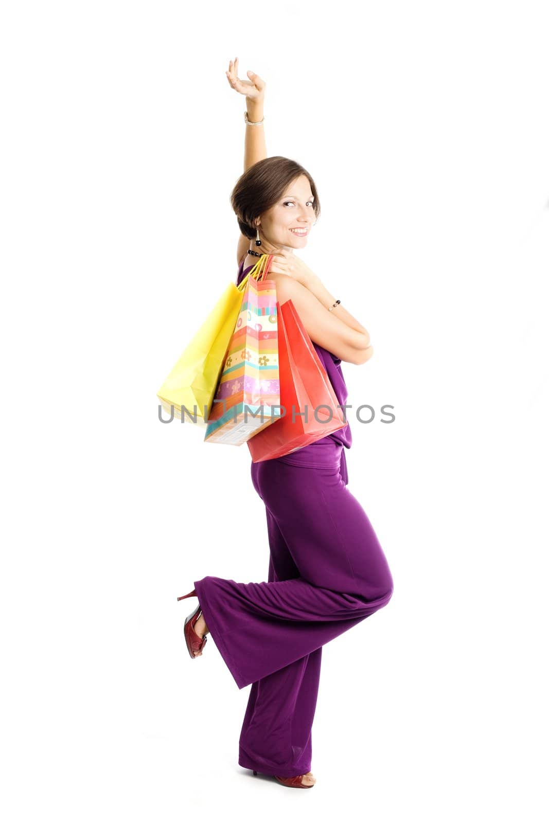 An image of a woman with bags