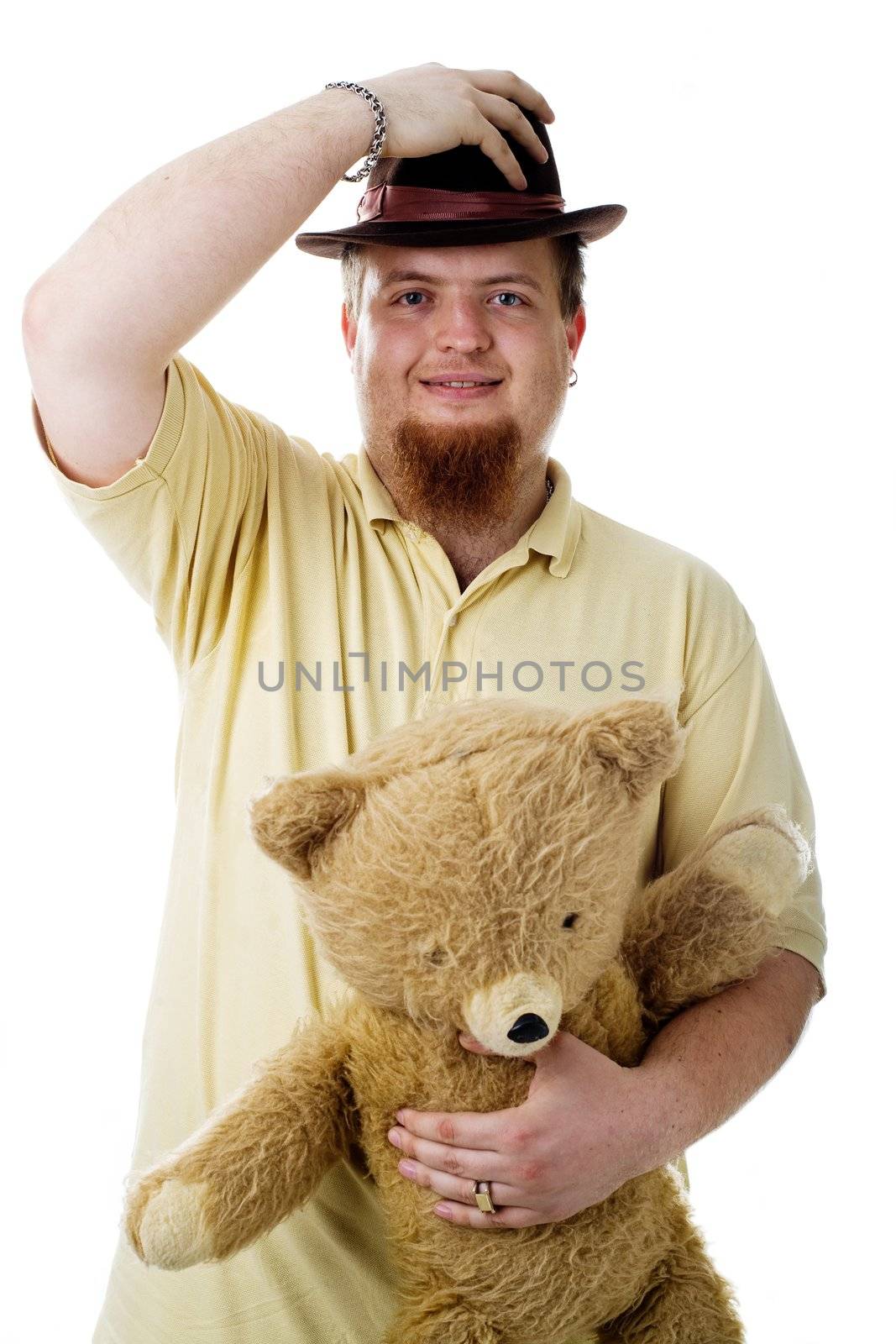 An image of a man with a hat and a toy
