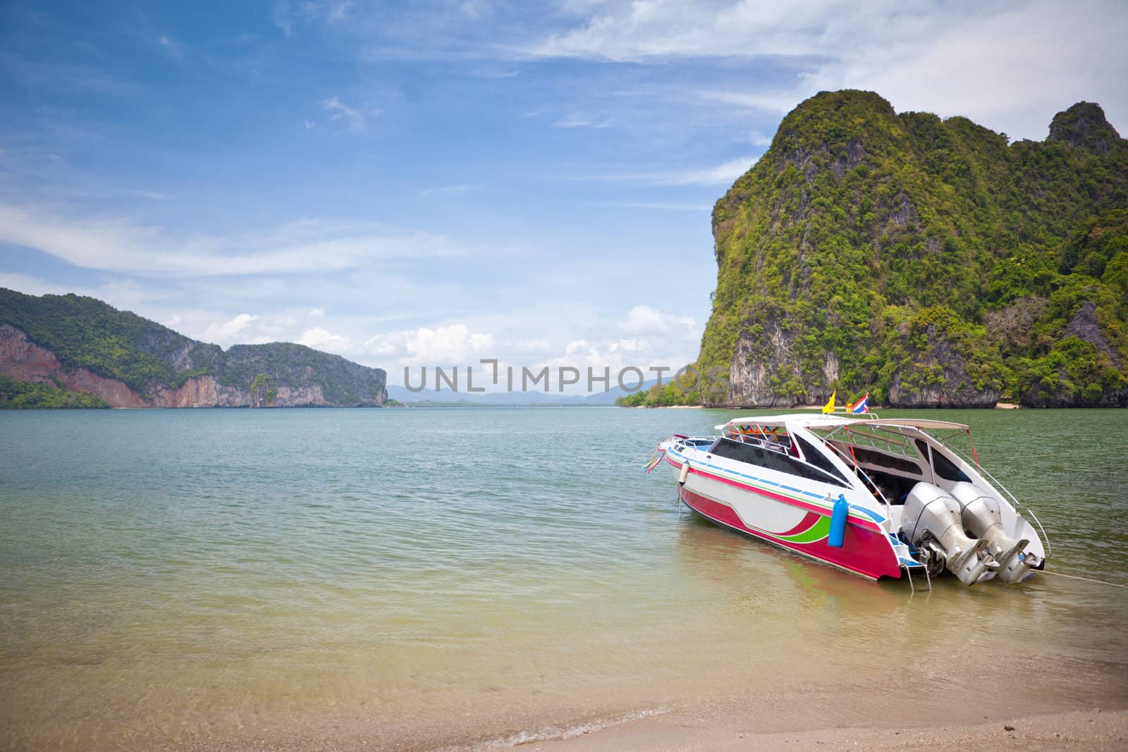 speed boat in tropical sea by witthaya