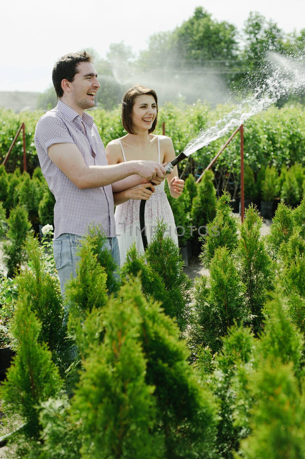 An image of a young couple in the garden