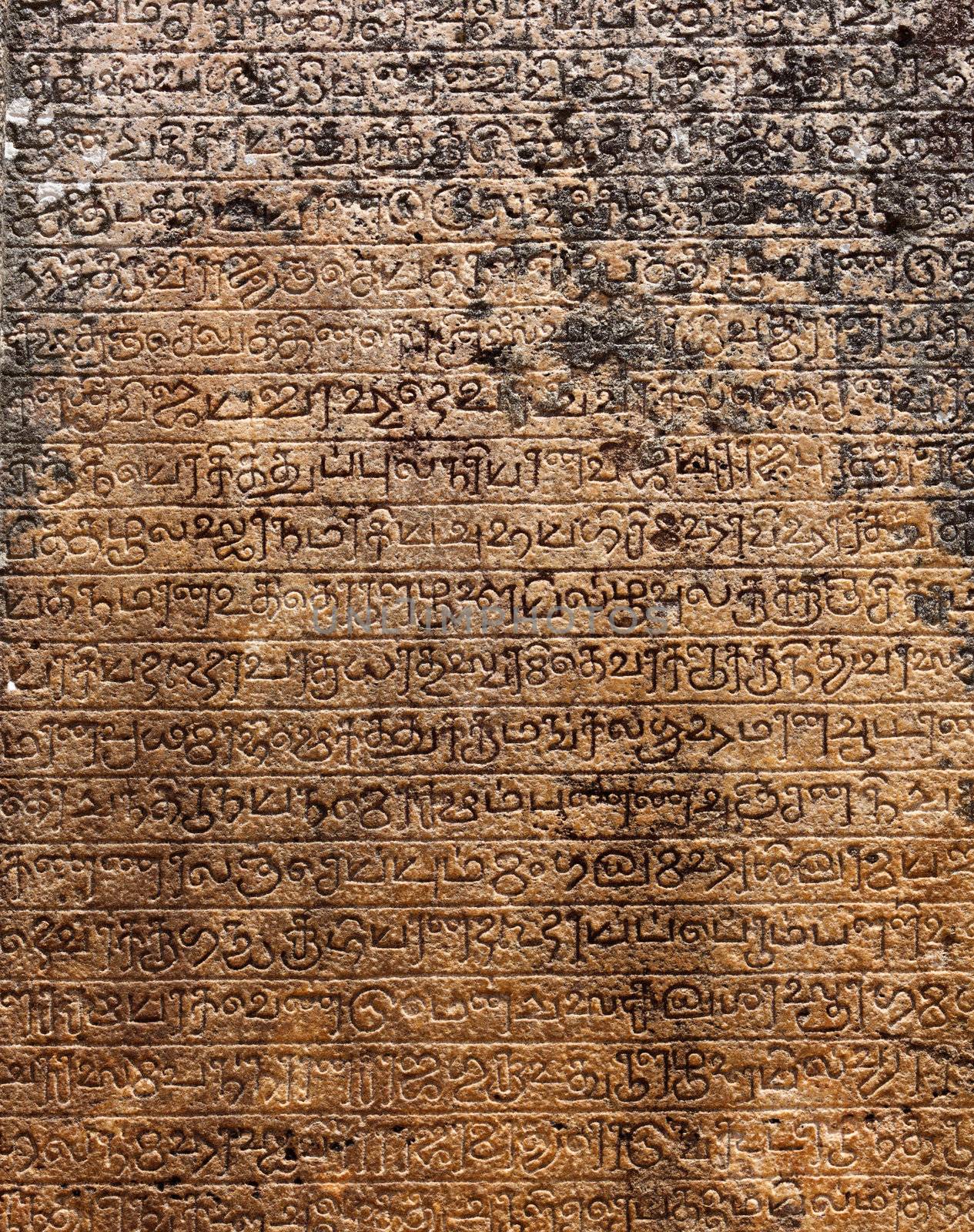 Ancient stone inscriptions in Singalese language texture. Pollonaruwa, Sri Lanka