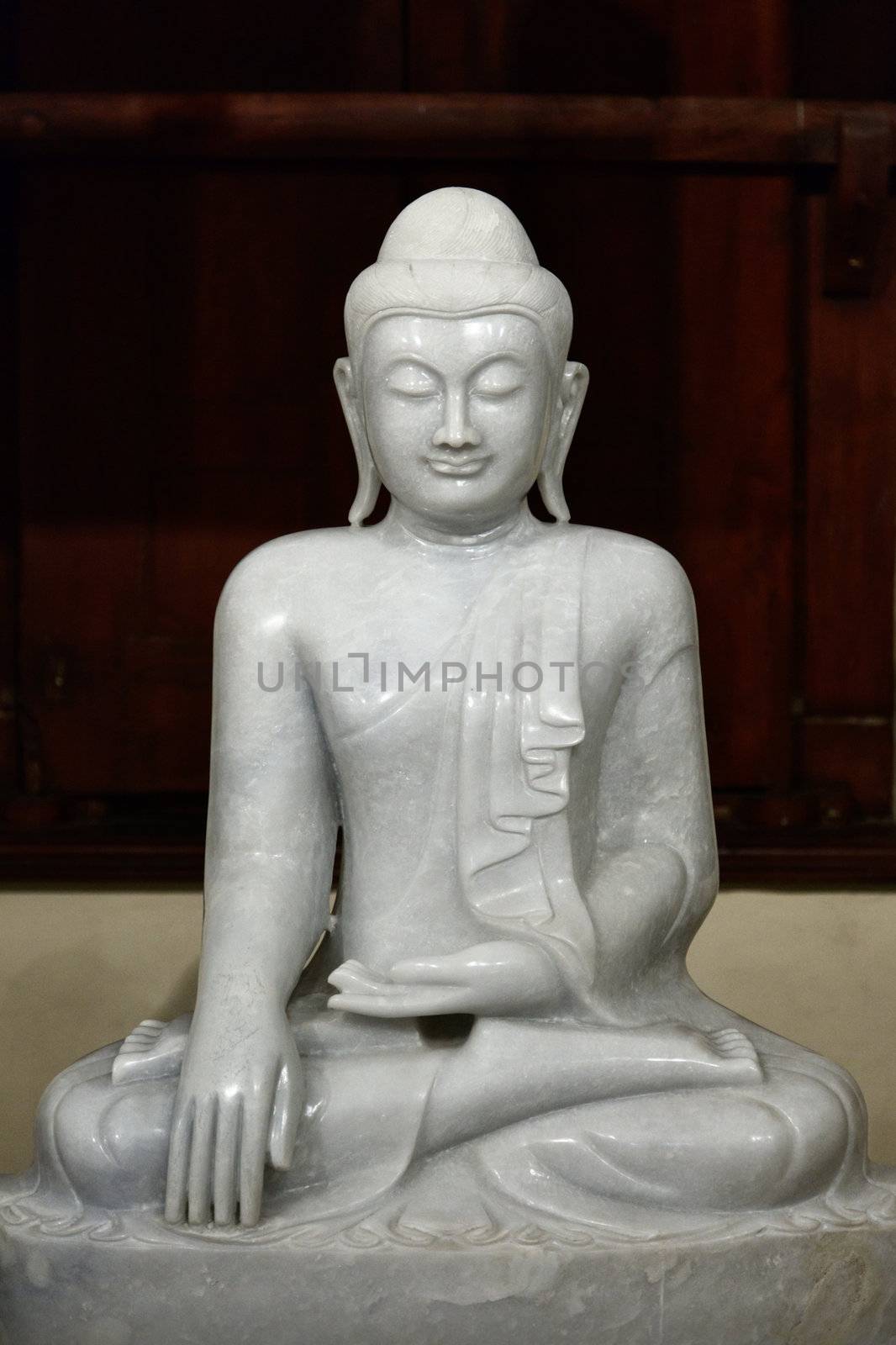 Sitting Buddha statue in temple. Sri Lanka