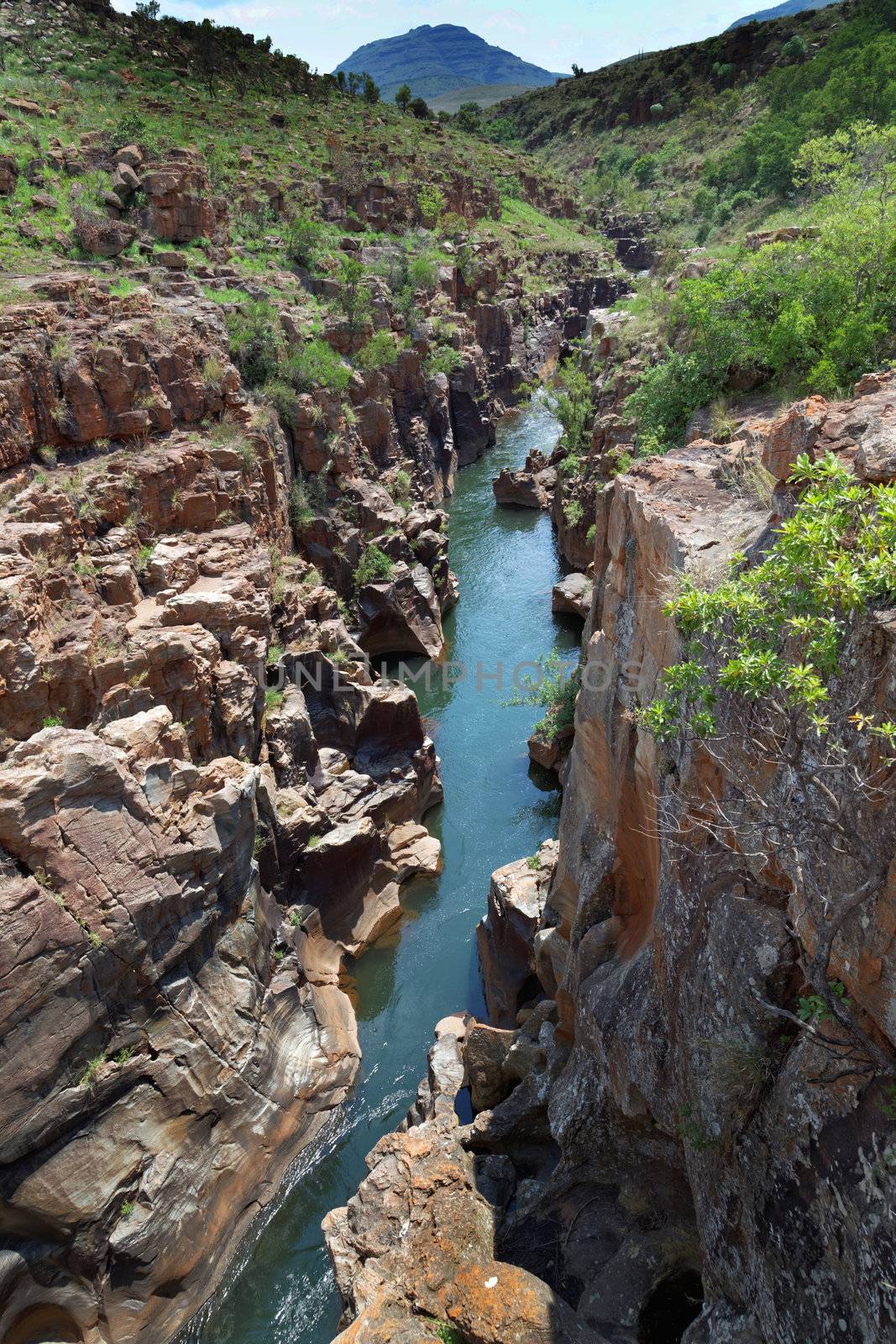 River flowing through a rocky gorge by Farina6000