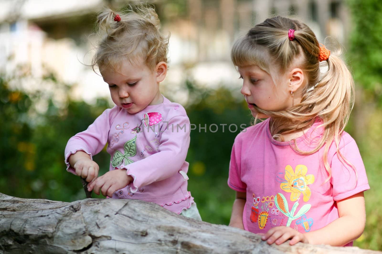 An image of two children playing outdoor