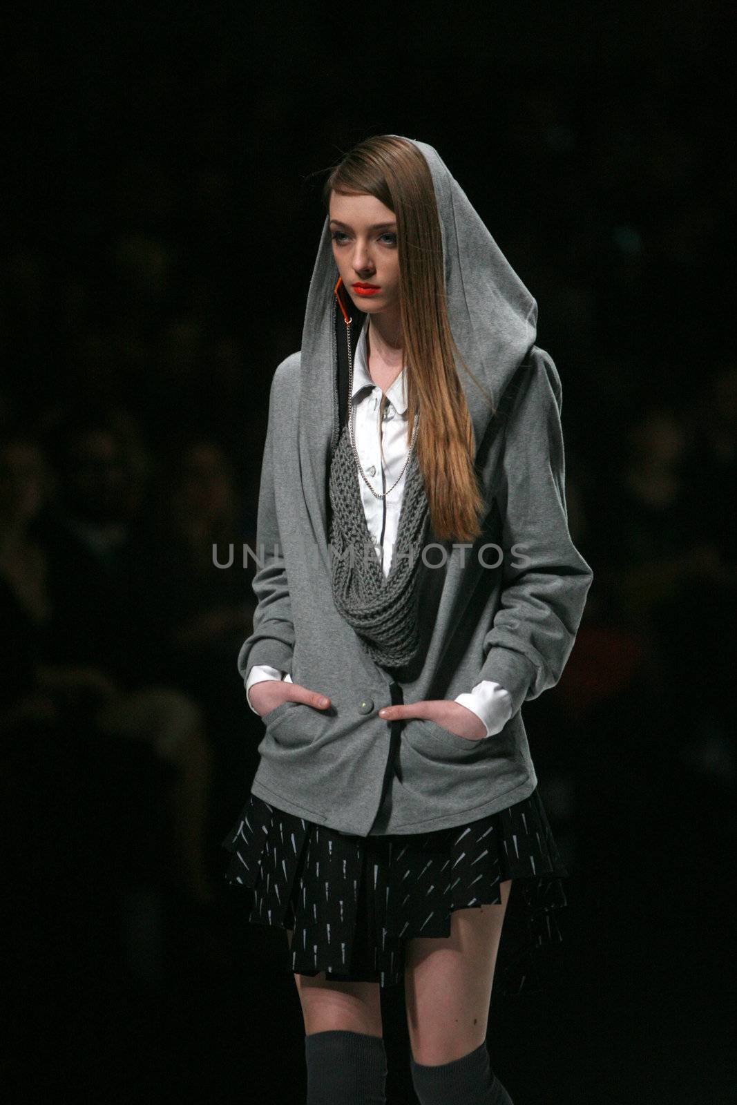 ZAGREB, CROATIA - MARCH 15: Fashion model wears clothes made by design group "Clash of 9" on "Dove FASHION.HR" show on March 15, 2012 in Zagreb, Croatia.