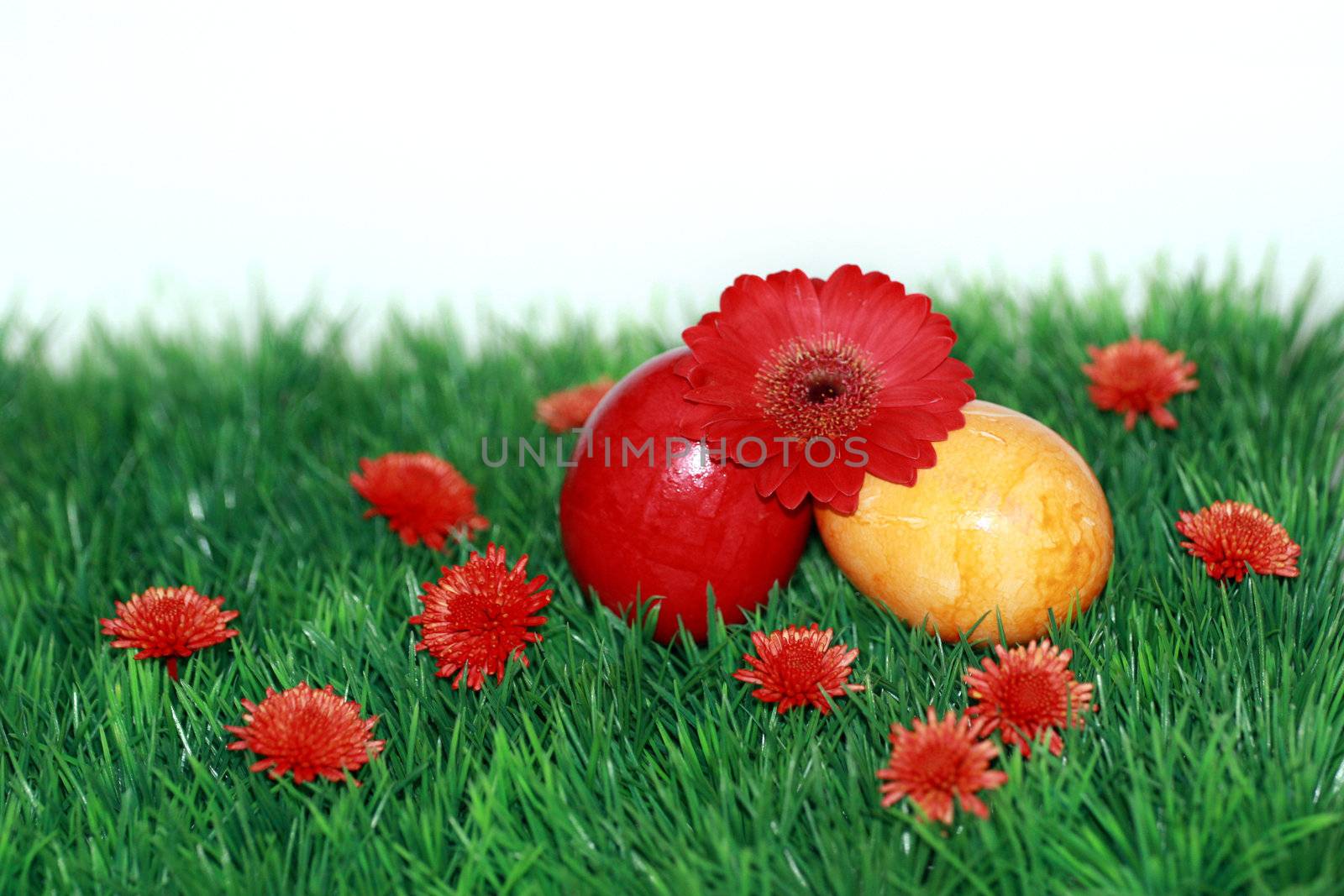 Red flowers and colored eggs by photochecker